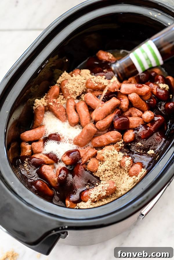 Lezzetiyle Baştan Çıkaracak Tarifler 7 Slow Cooker Little Smokies served in a bowl with toothpicks
