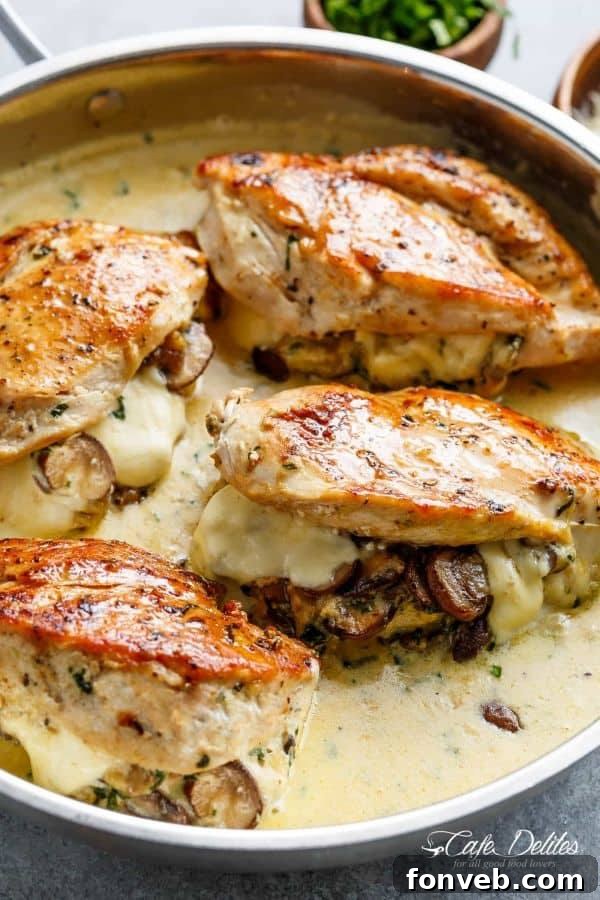 Lezzetiyle Baştan Çıkaracak Tarifler 20 Cheesy Garlic Butter Mushroom Stuffed Chicken, sliced open