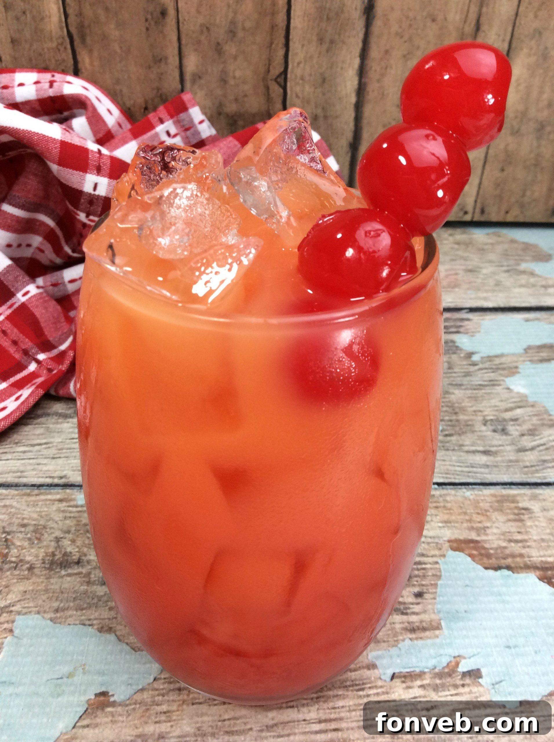 Twilight Tryst 2 Two vibrant 'Take Me to the Bedroom' Cocktails, garnished with bright red cherries and ice, ideal for a memorable girls' night.