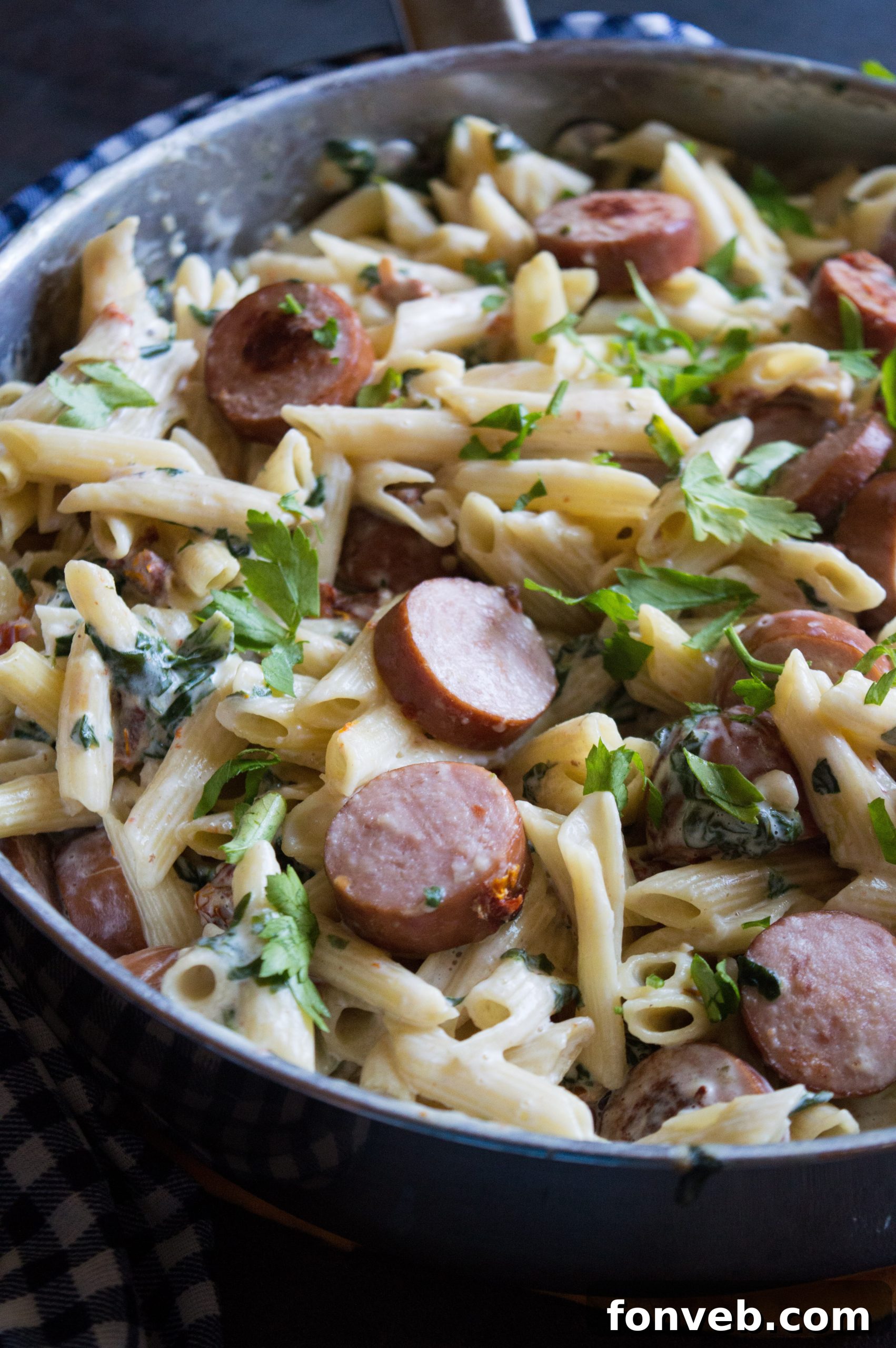 Luscious Garlic Mozzarella Pasta with Spinach and Sausage 11 A final close-up of the Creamy Mozzarella Pasta with Spinach and Sausage, highlighting its deliciousness
