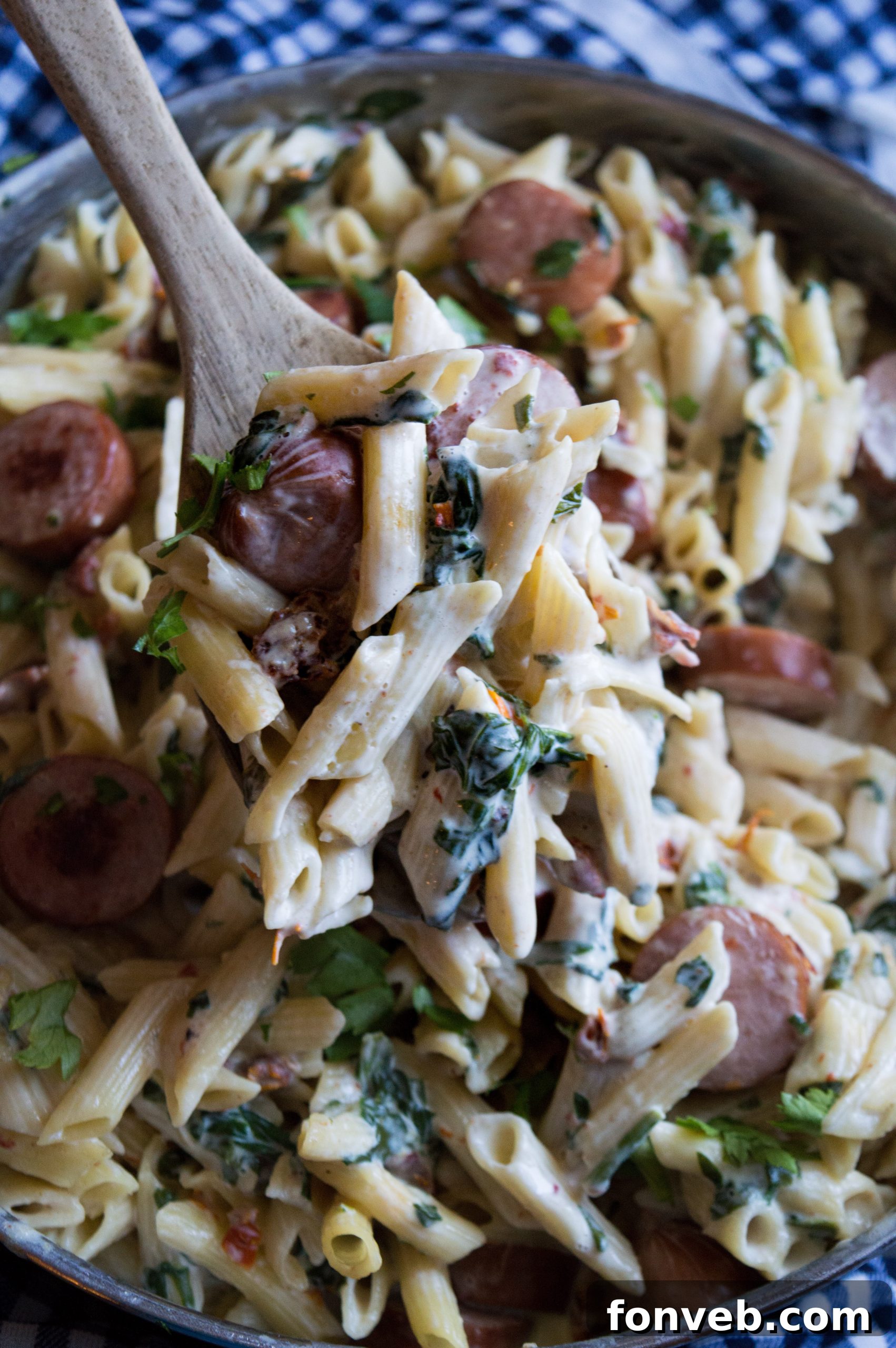Luscious Garlic Mozzarella Pasta with Spinach and Sausage 3 Close-up of the rich, creamy sauce with spinach and sausage in Creamy Mozzarella Pasta