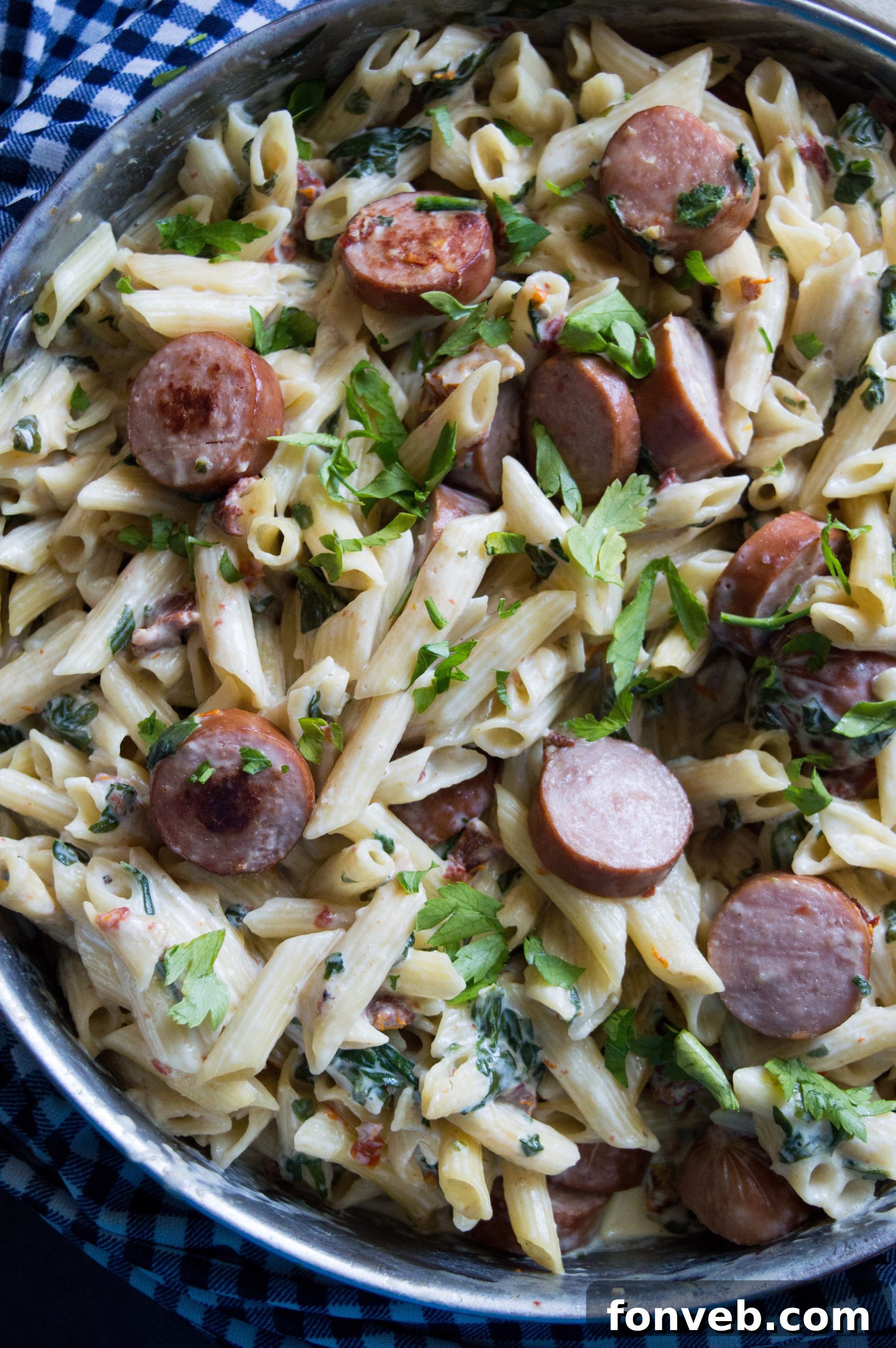 Luscious Garlic Mozzarella Pasta with Spinach and Sausage 7 The finished Creamy Mozzarella Pasta with Spinach and Sausage, glistening with sauce