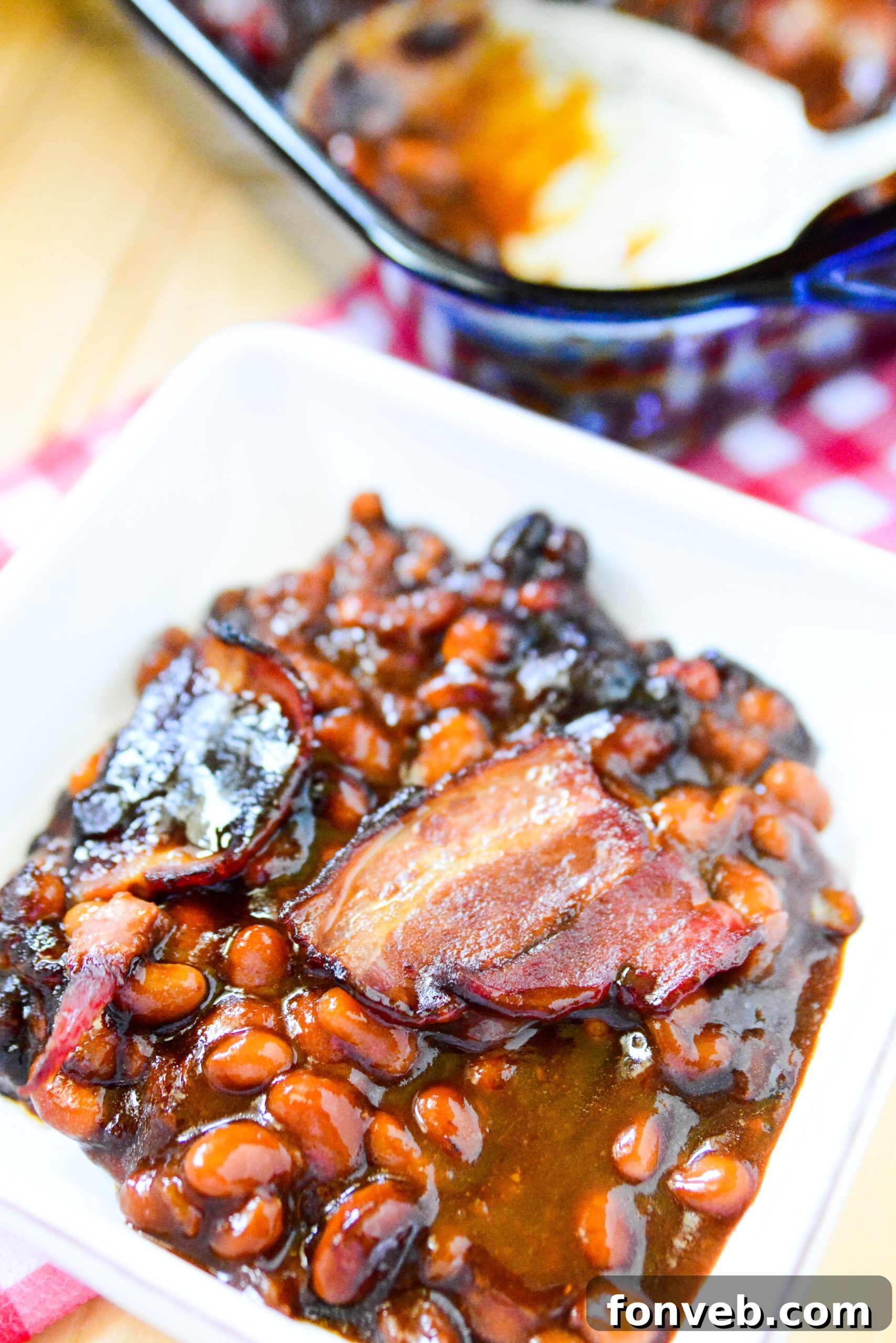 Brown Sugar Bacon Baked Beans in a white bowl