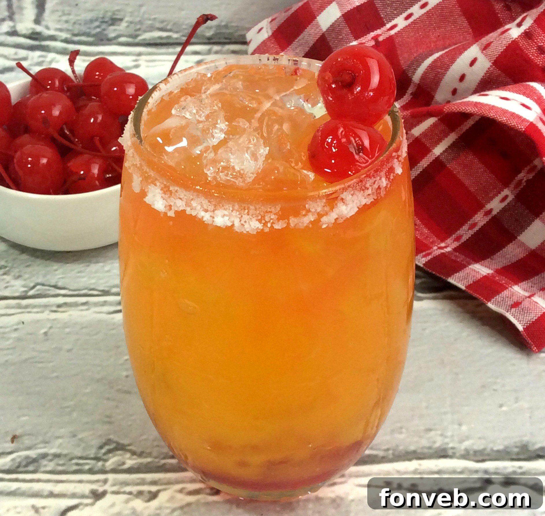 Three Take Me on the Couch Cocktails ready to be enjoyed, showcasing the beautiful gradient and garnishes.