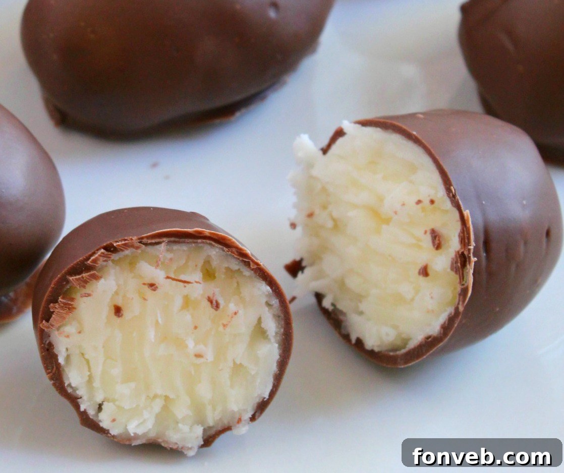 Collection of finished homemade coconut cream eggs displayed beautifully
