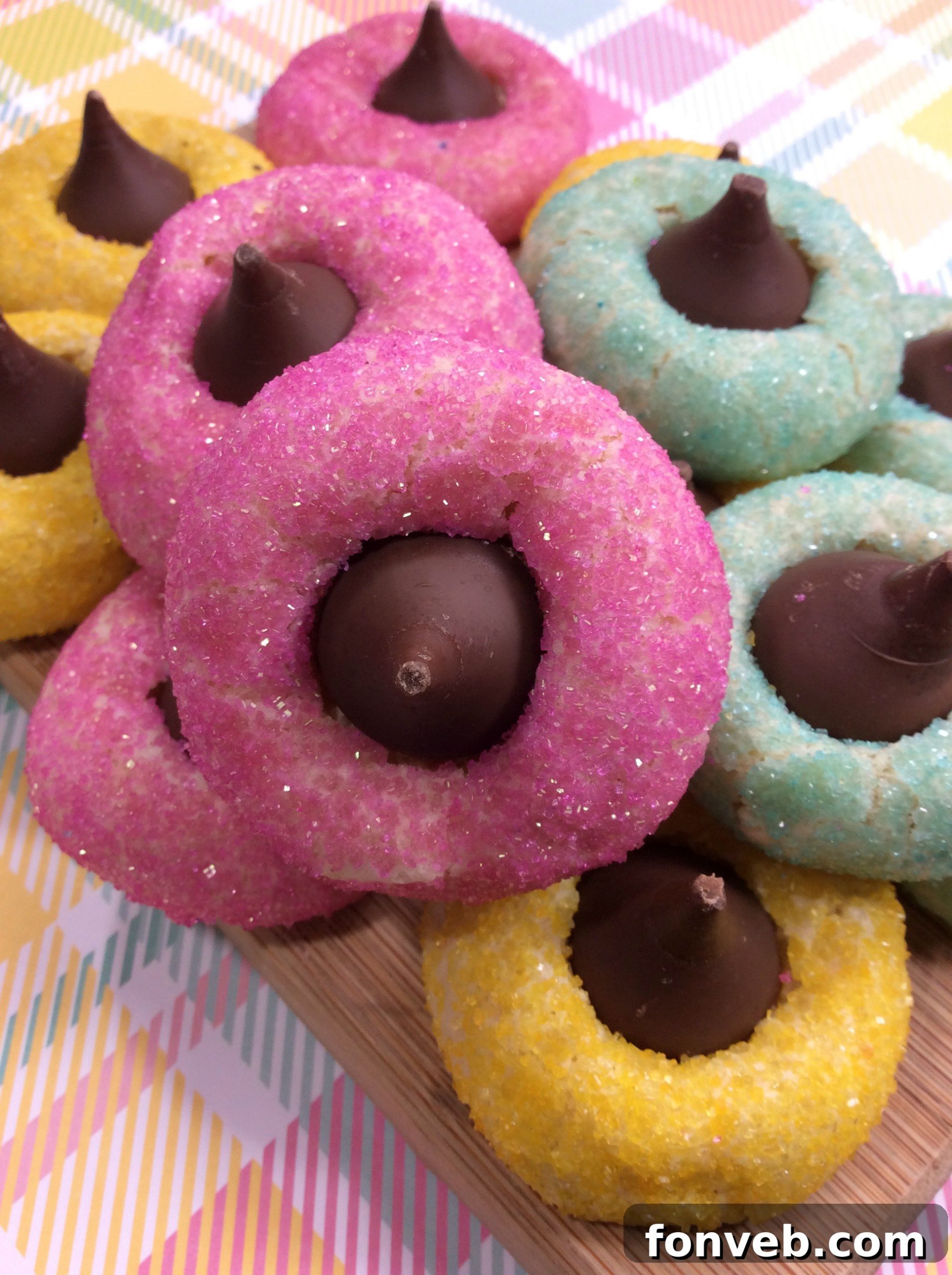 Close-up of freshly baked Springtime Thumbprint Cookies with pastel sprinkles