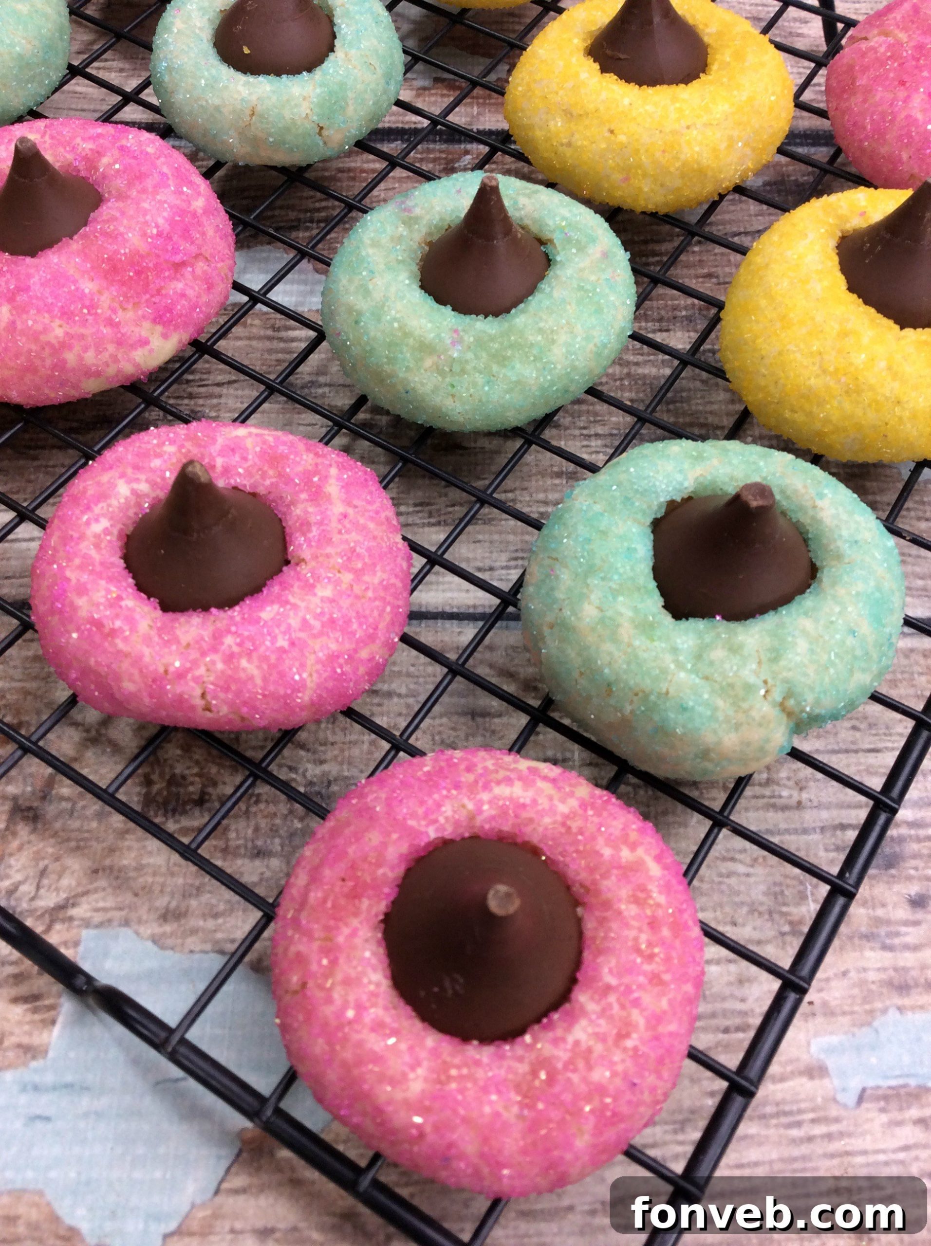 Finished plate of Springtime Thumbprint Cookies with melted chocolate centers, ready to serve