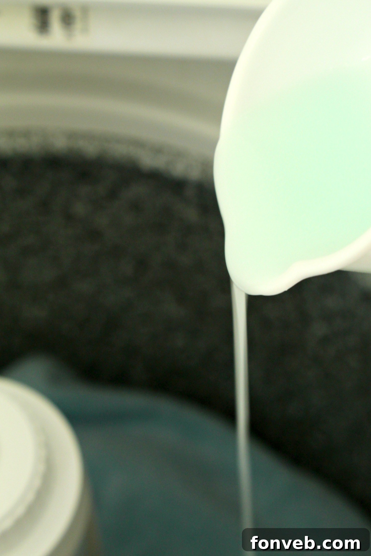 Large bottle of hair conditioner with an 'Ocean Breeze' label