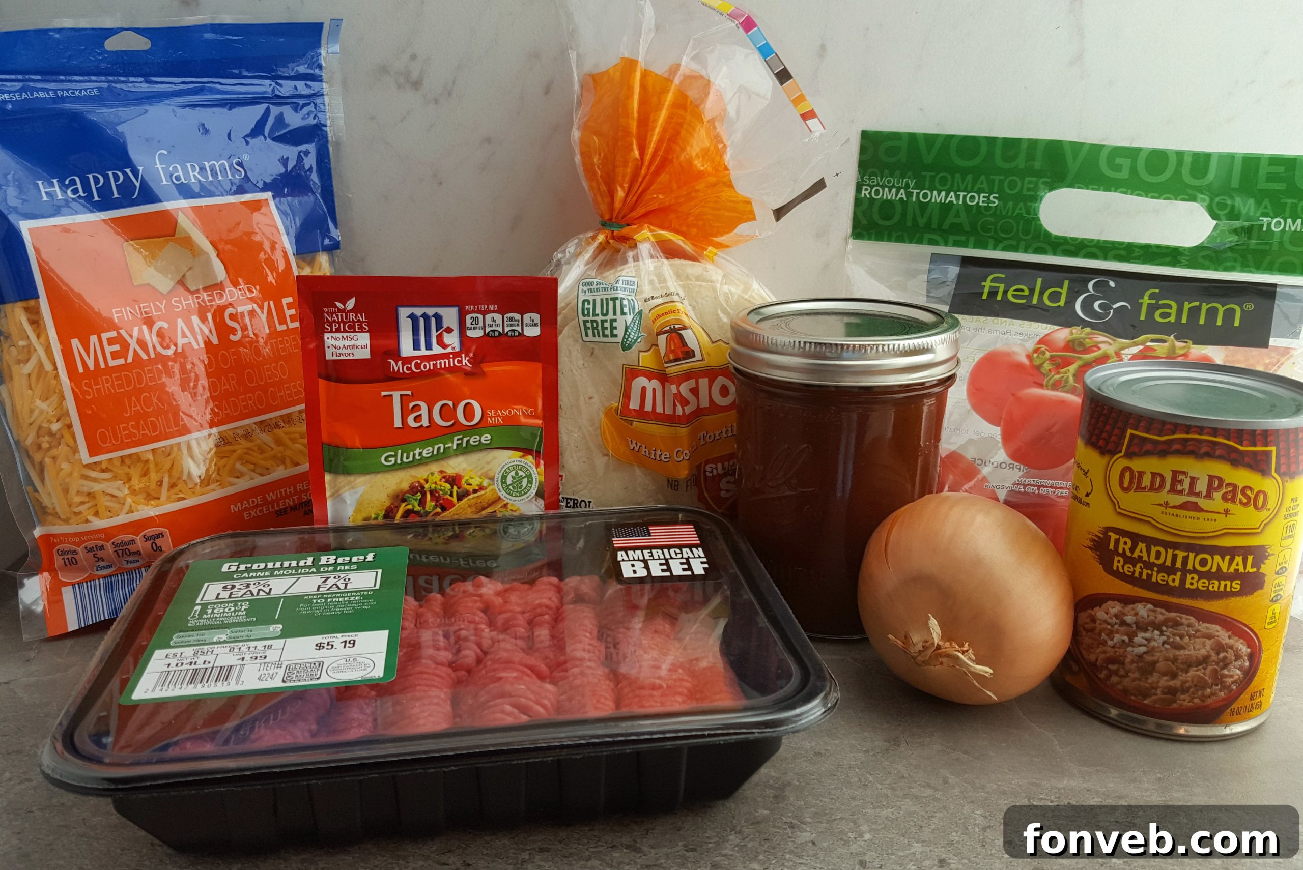 Preparing ingredients for Mexican Lasagna: ground beef and cheese.