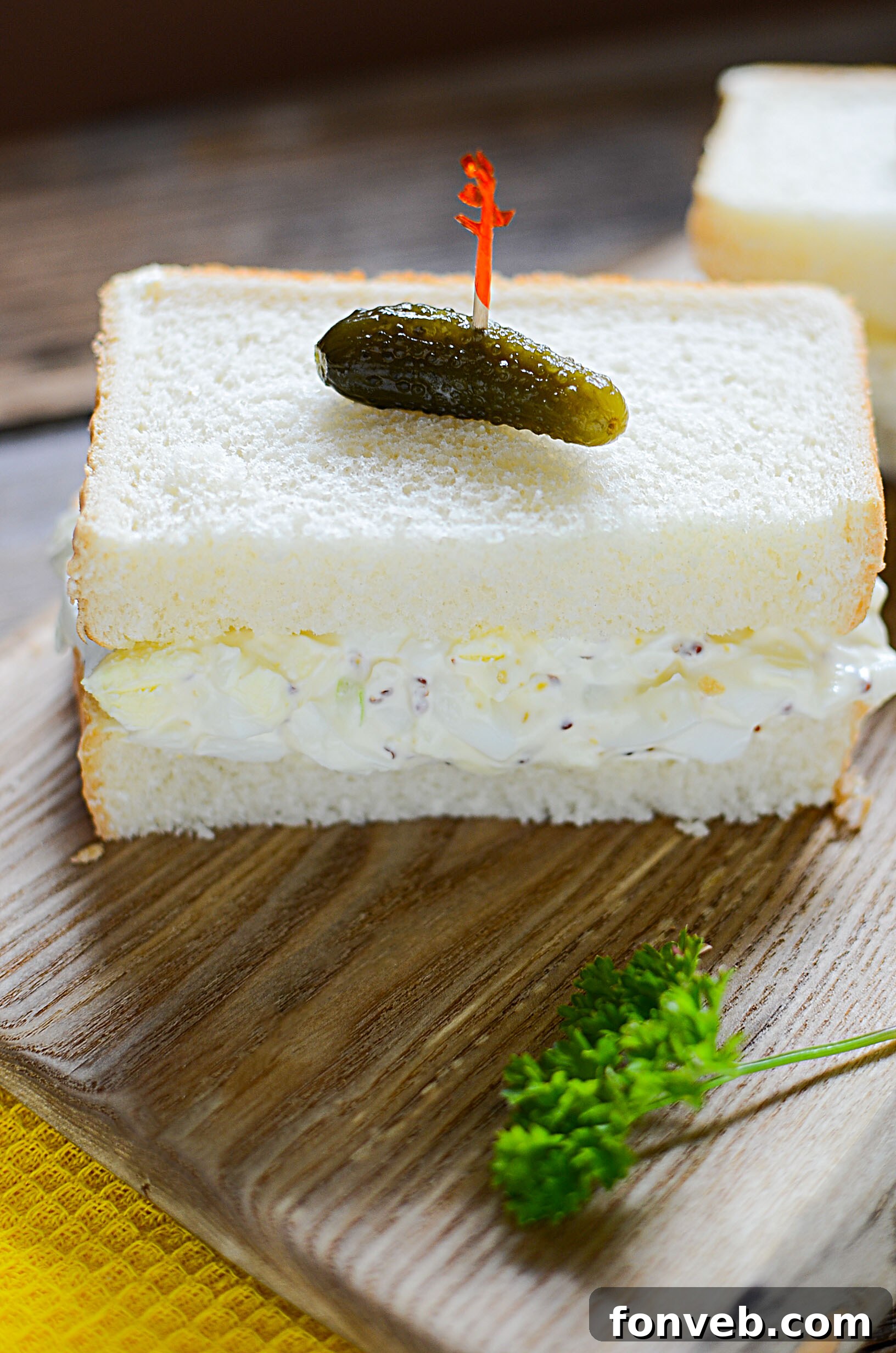 A bowl of creamy egg salad, showcasing its appealing texture and rich color.