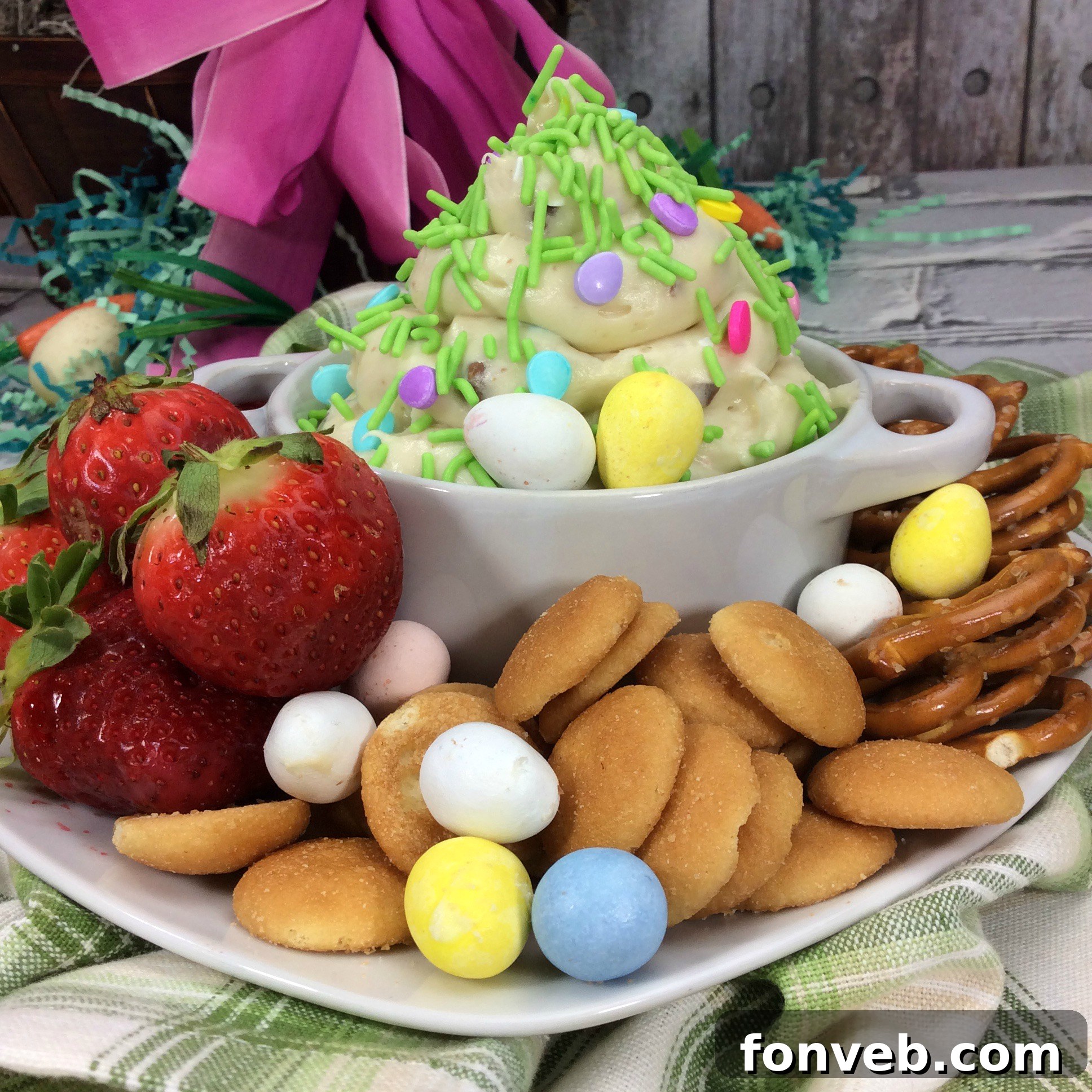 Fresh Bloom Cheesecake Dip 3 Ingredients for Springtime Cheesecake Dip laid out on a white surface, including cream cheese, butter, sugars, vanilla, and Cadbury Mini Eggs