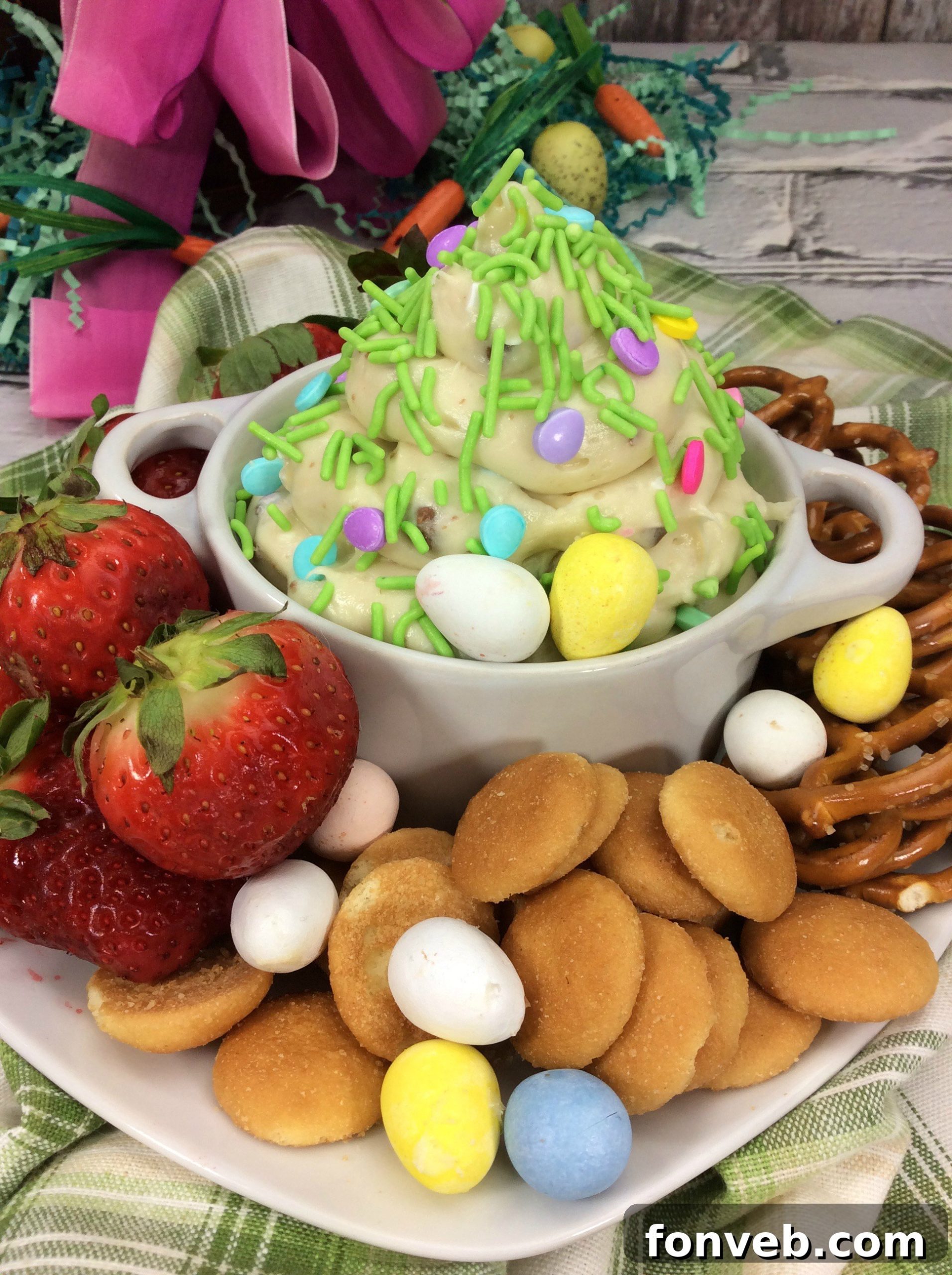 Fresh Bloom Cheesecake Dip 4 A bowl of Springtime Cheesecake Dip with Cadbury Mini Eggs, surrounded by graham crackers for dipping