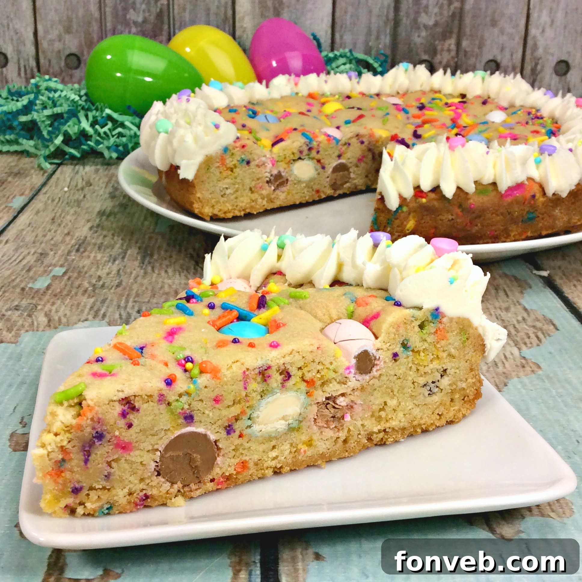 Beautifully decorated Easter Cookie Pie with colorful candies and vanilla frosting