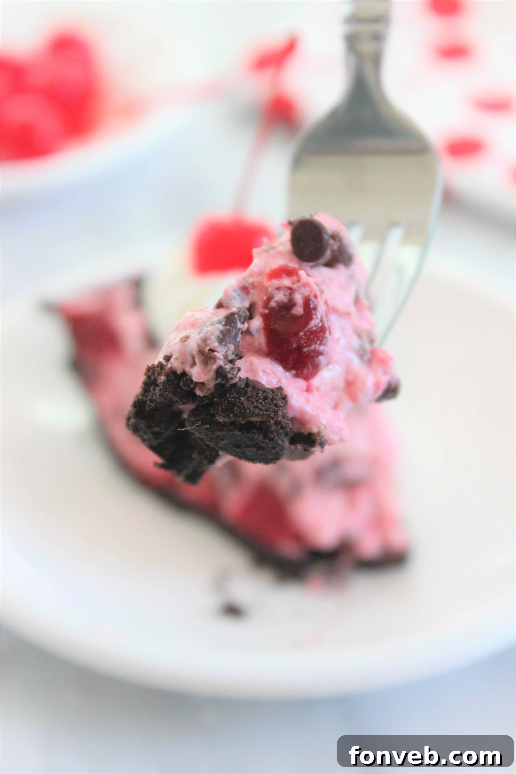 Close-up of the creamy cherry filling with mini chocolate chips in a pie crust