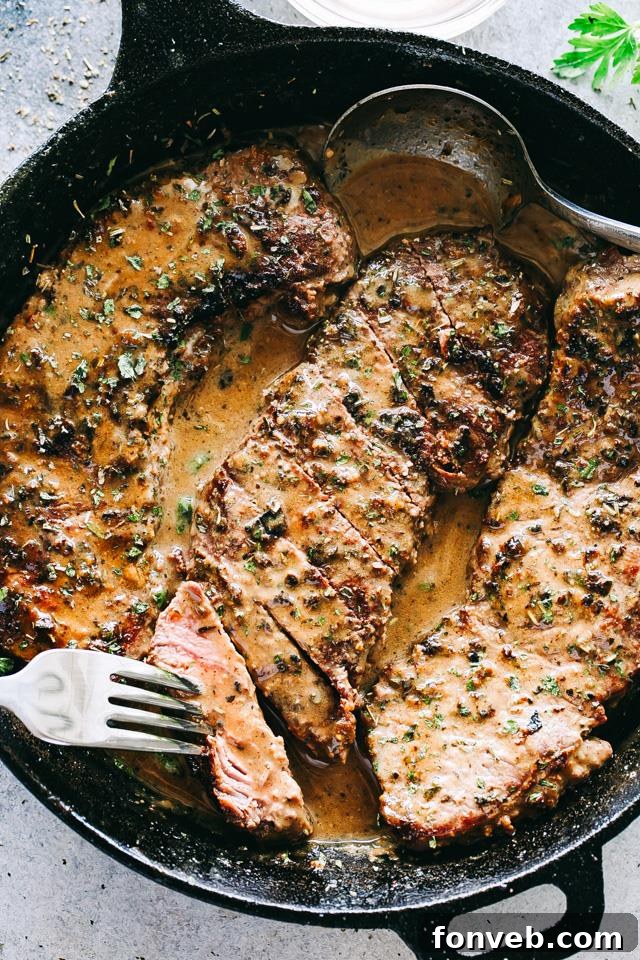 Sizzling Skillet Bourbon Steak, a quick and delicious beef recipe cooked in a pan