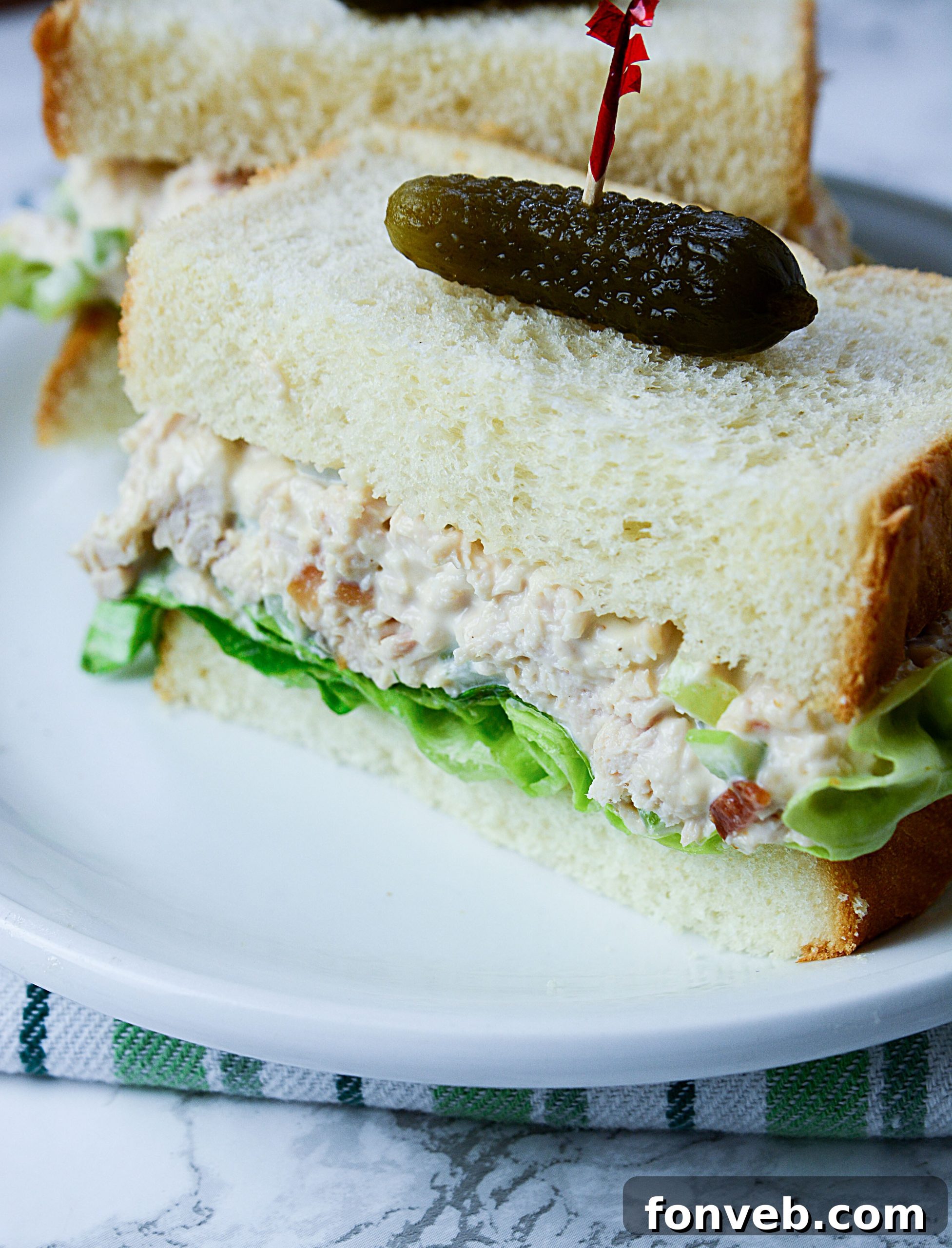 Creamy chicken salad served in a bowl with crackers