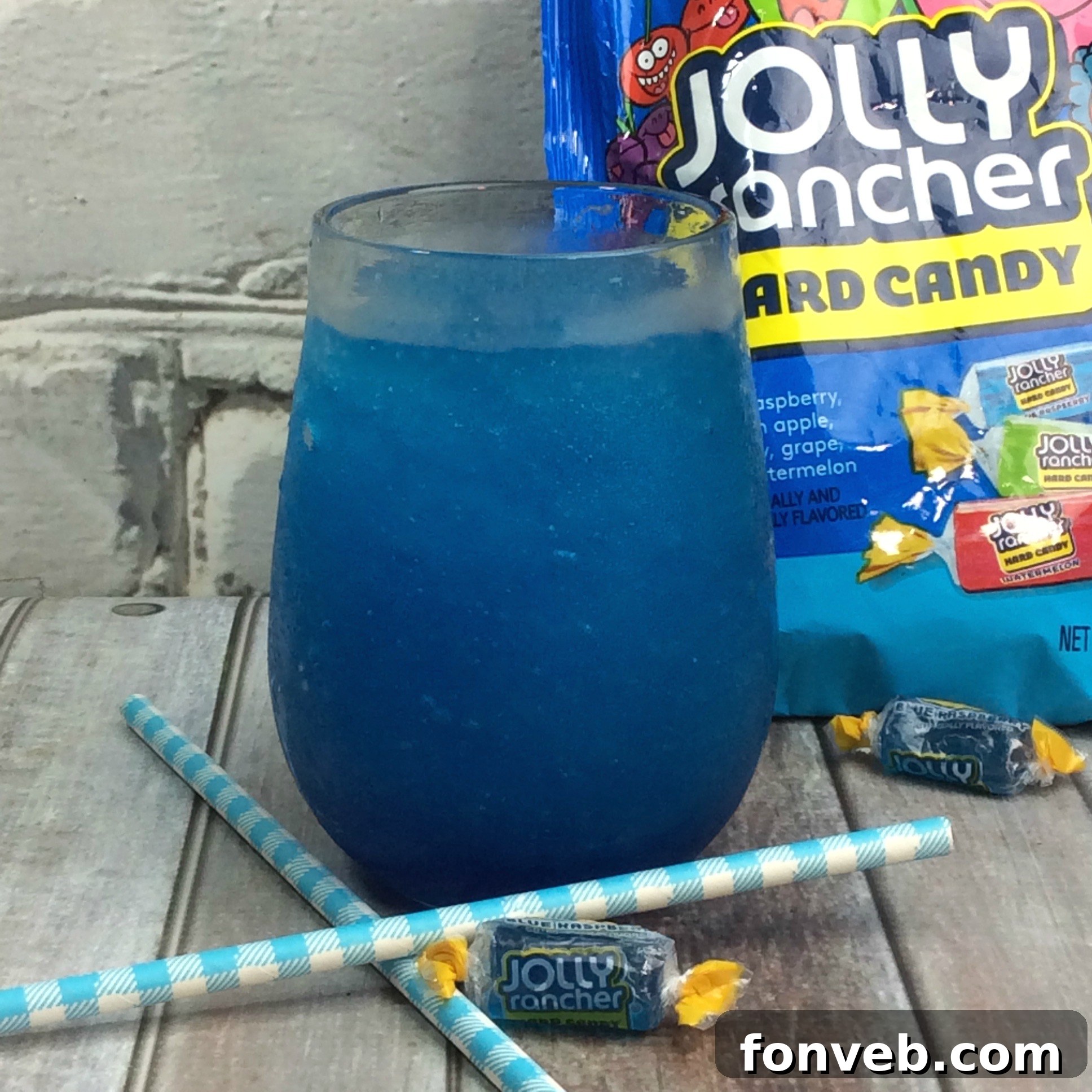Blue Raspberry Jolly Rancher Cocktail in a glass ready to be served