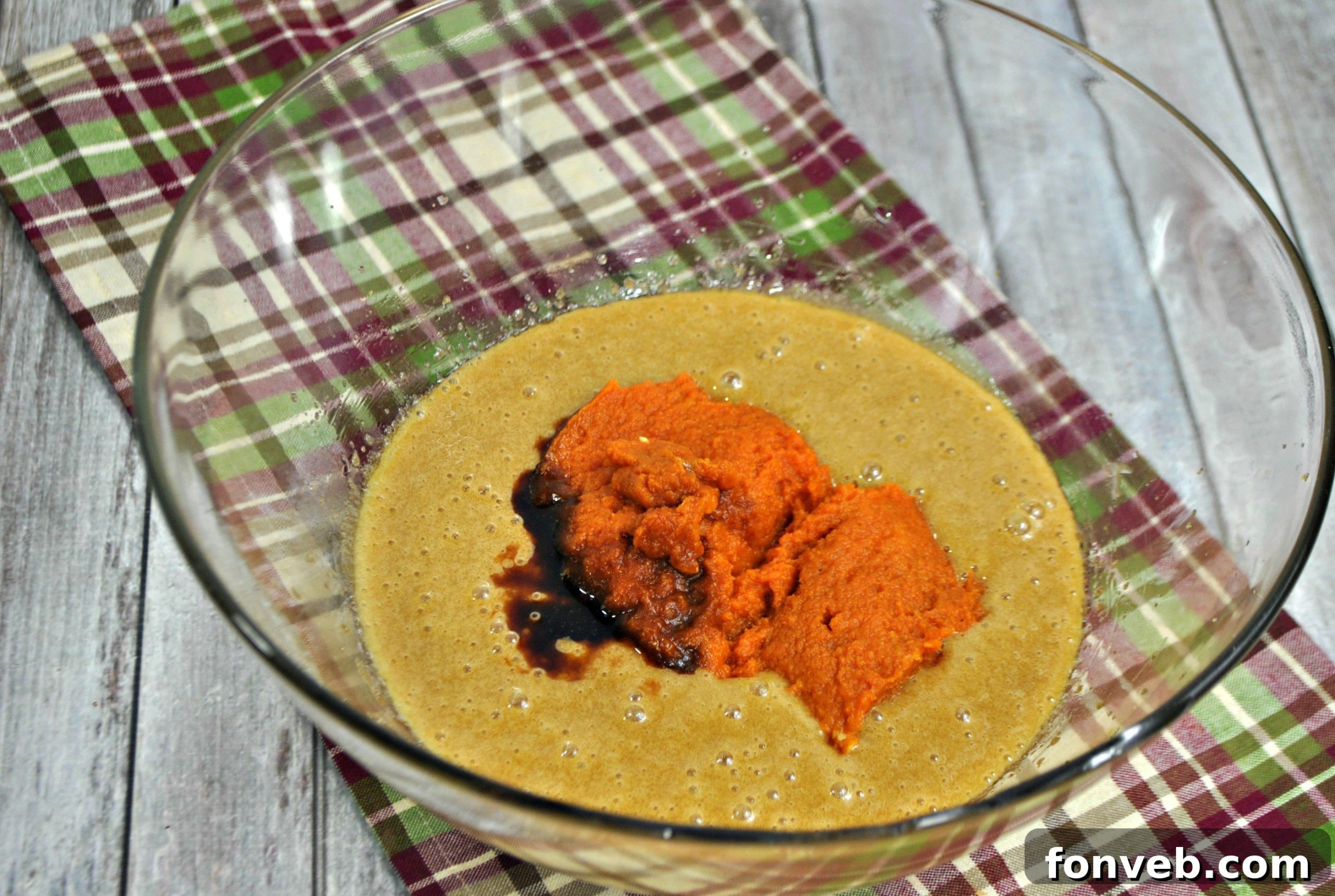 Close-up of freshly baked pumpkin whoopie pies cooling on a rack