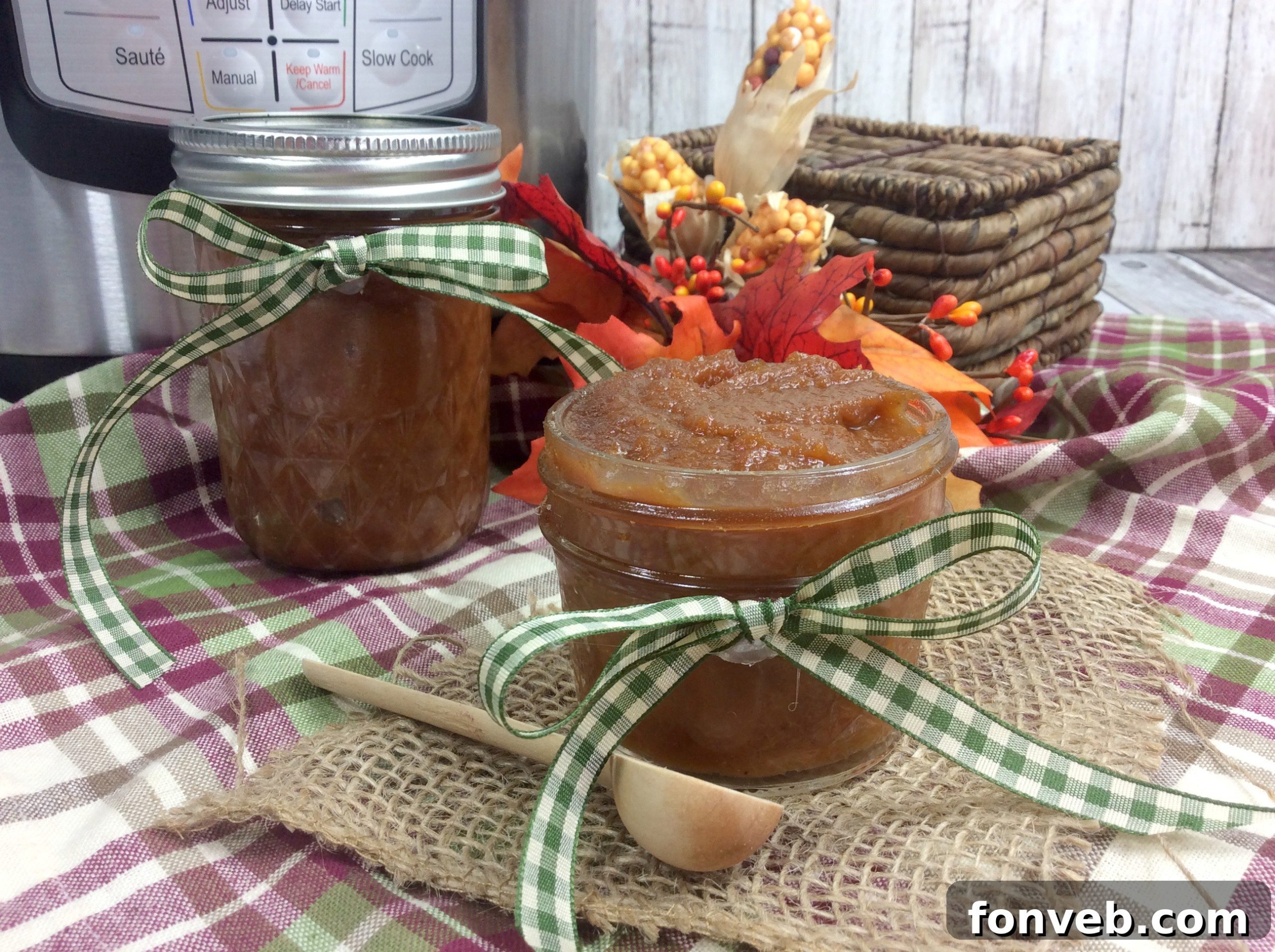 Spiced Instant Pot Pumpkin Butter 4 Three jars of pumpkin butter with twine and labels, ready for gifting