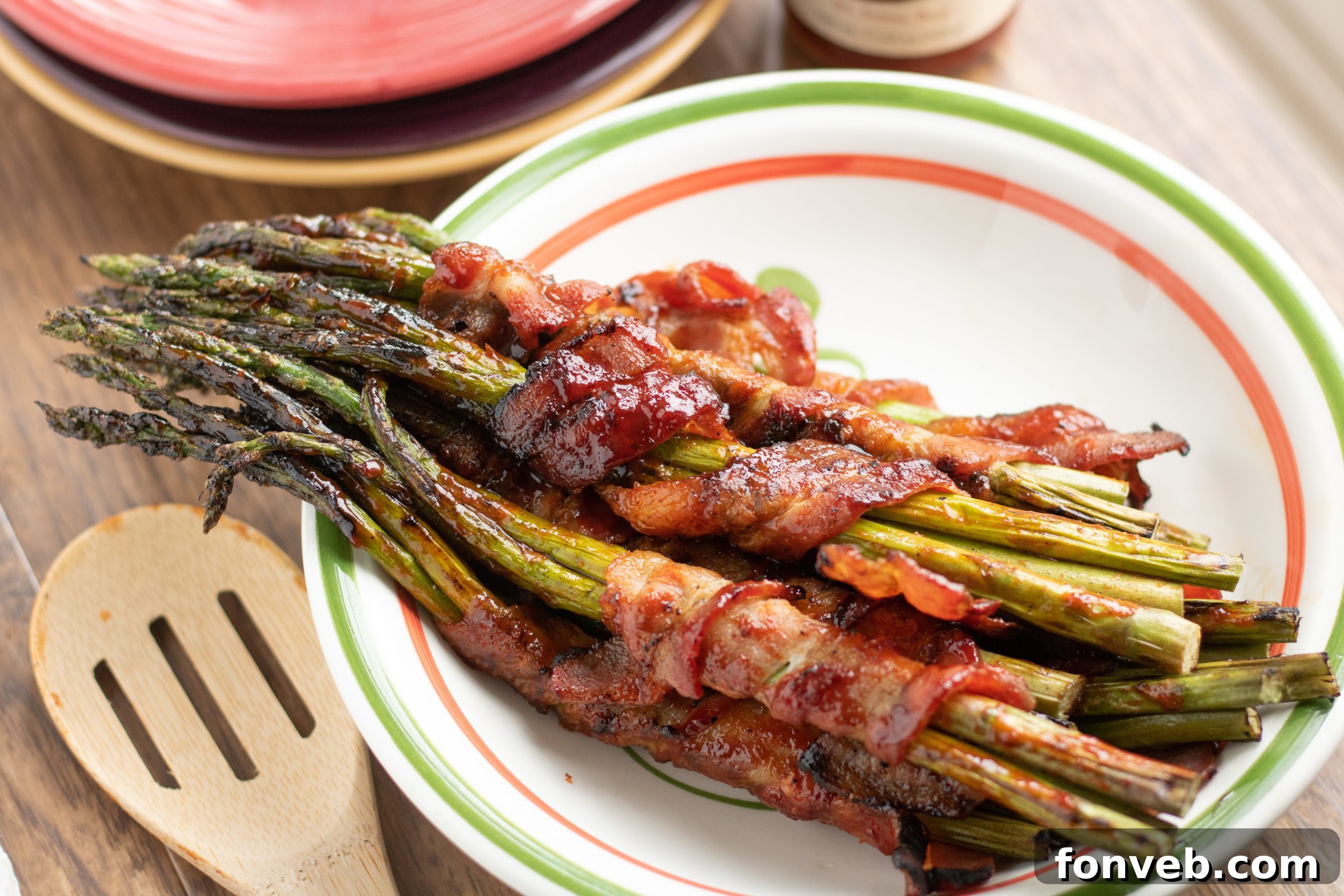 Close-up of the delicious brown sugar glaze on bacon wrapped asparagus