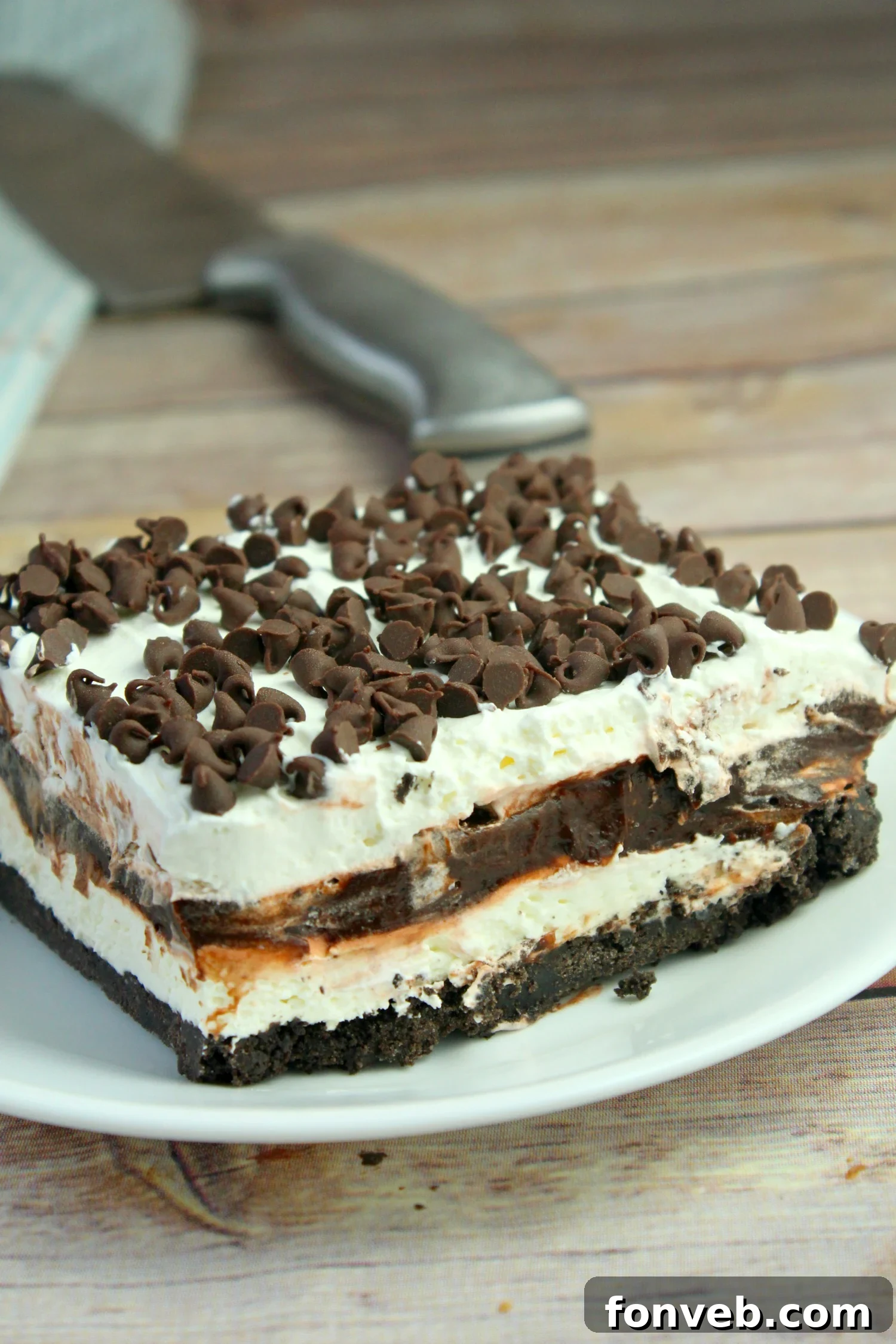 A festive holiday-themed setting with the No-Bake Chocolate Lasagna taking center stage, suggesting its suitability for celebrations.