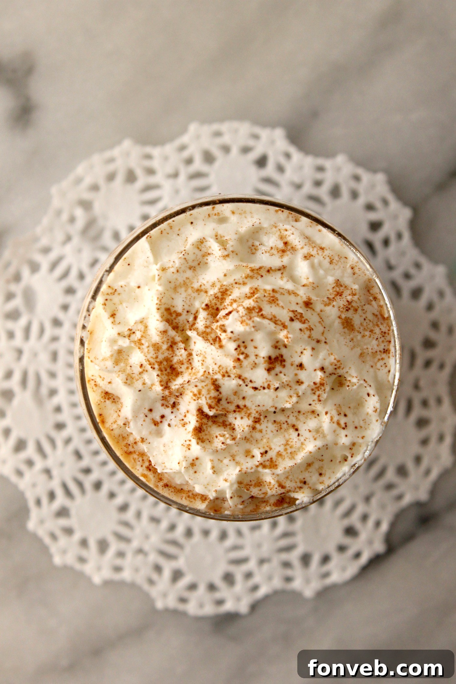 Ingredients for homemade pumpkin spice coffee creamer laid out on a kitchen counter