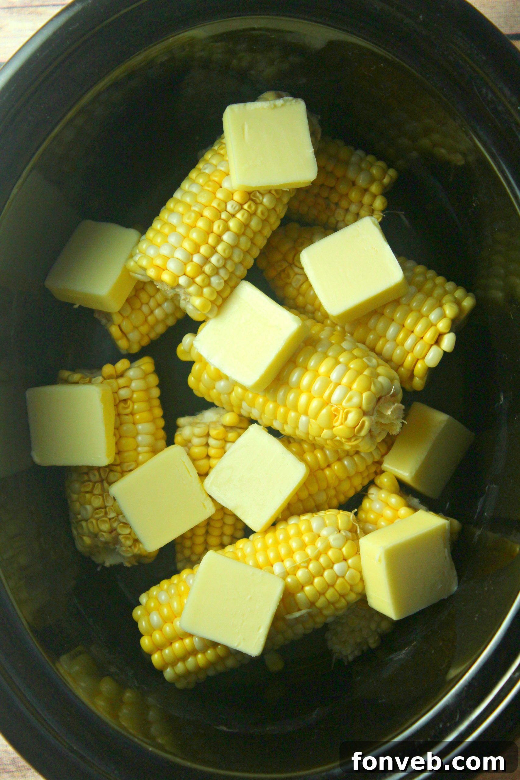 Fresh corn cobs ready for the slow cooker