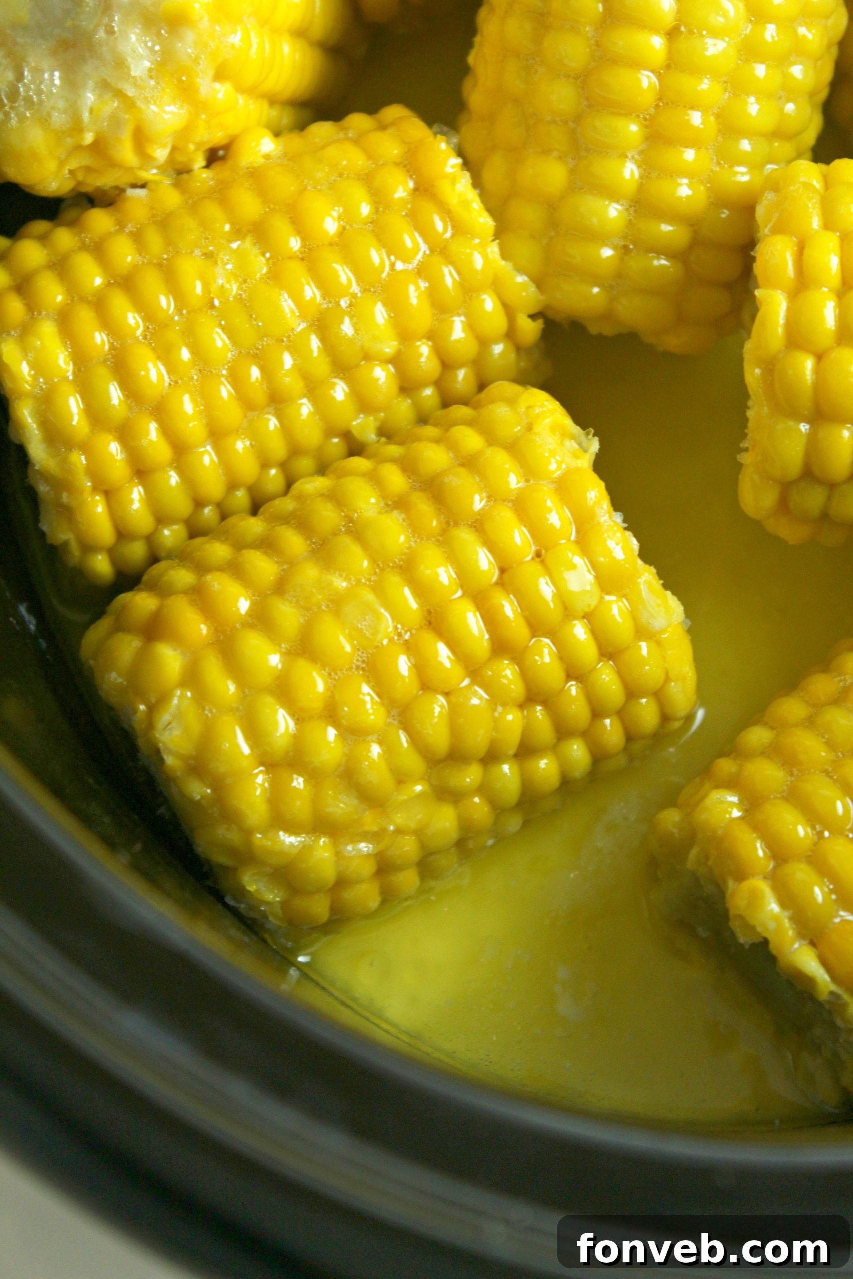 Cooked corn on the cob in a slow cooker