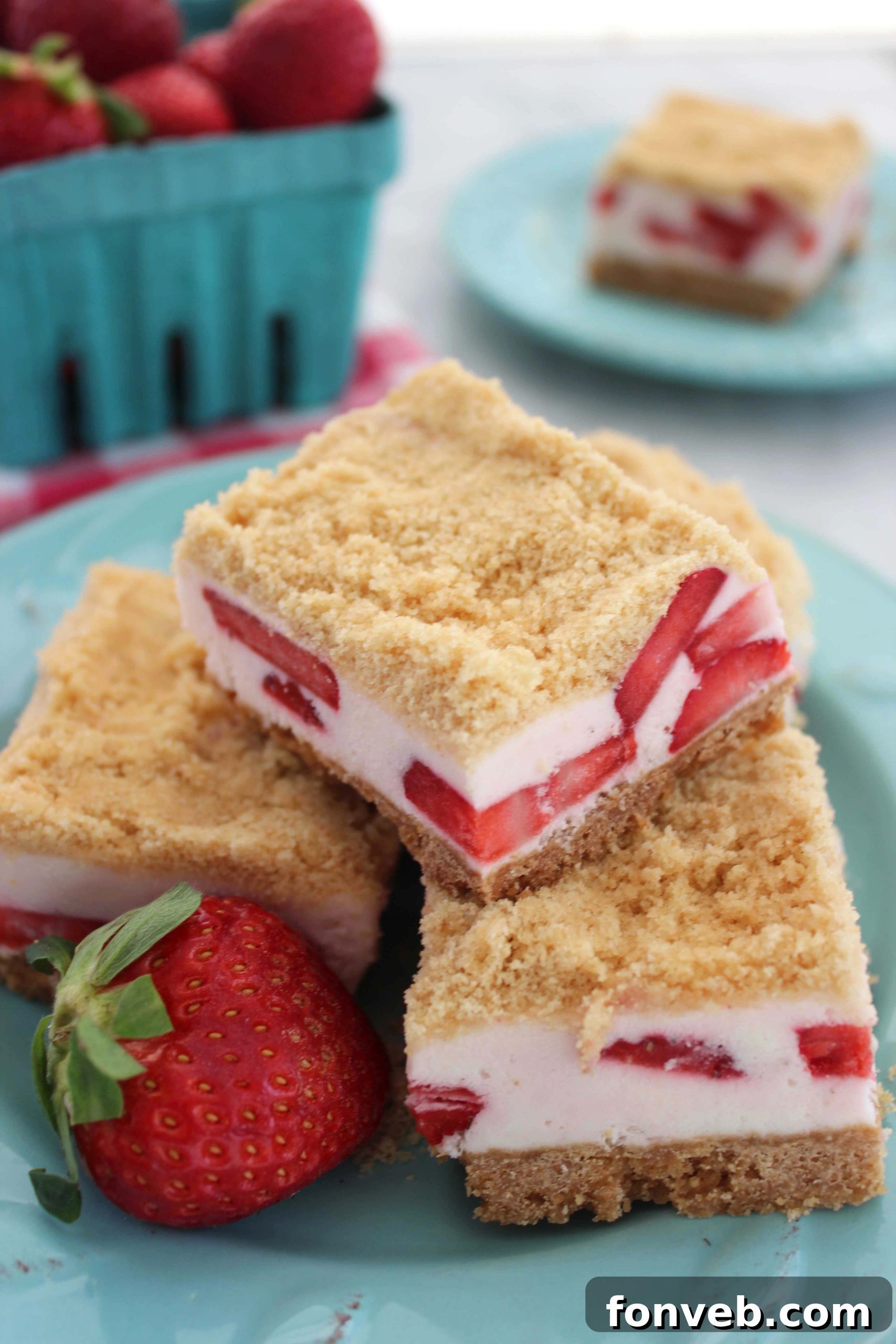 Strawberry Sugar Cookie Dream Bars 5 A selection of Strawberry Dream Sugar Cookie Bars presented on a serving tray, ready for a party or gathering.