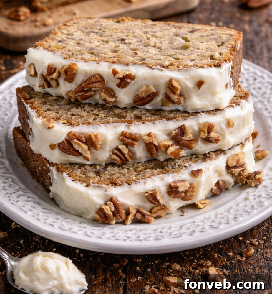 A perfectly baked loaf of Southern Hummingbird Bread, still warm and unfrosted, showing its golden-brown crust and moist interior.