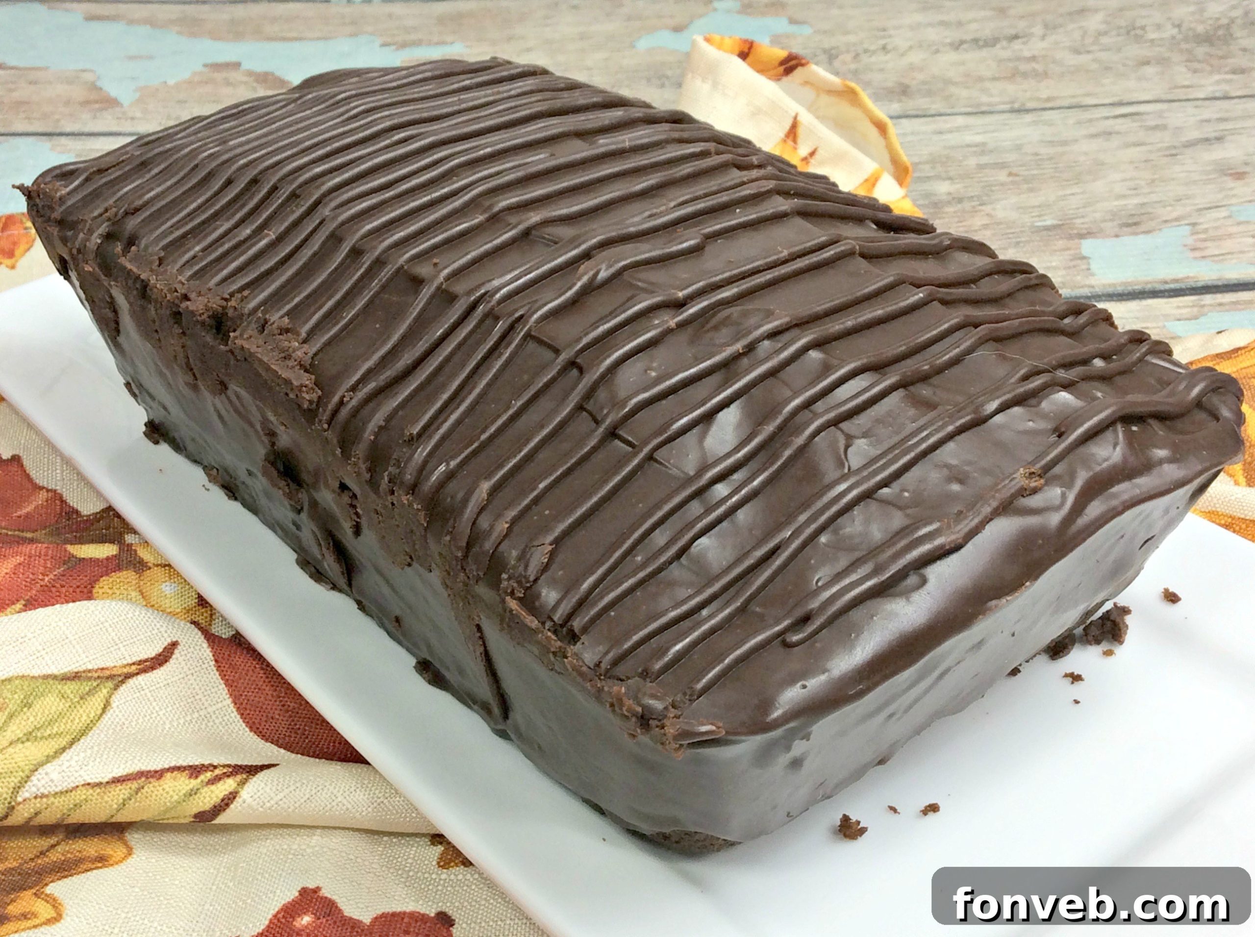Sliced chocolate pumpkin pound cake showing moist interior