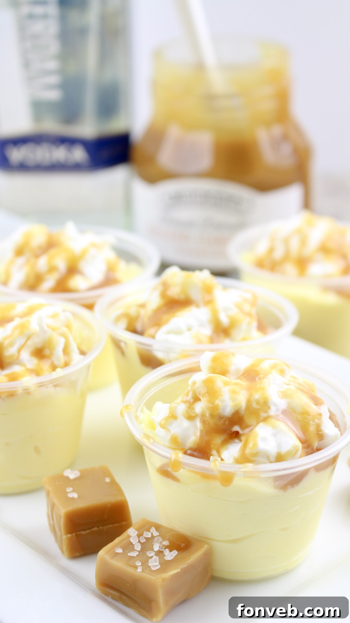 Close up of a salted caramel pudding shot, perfectly garnished