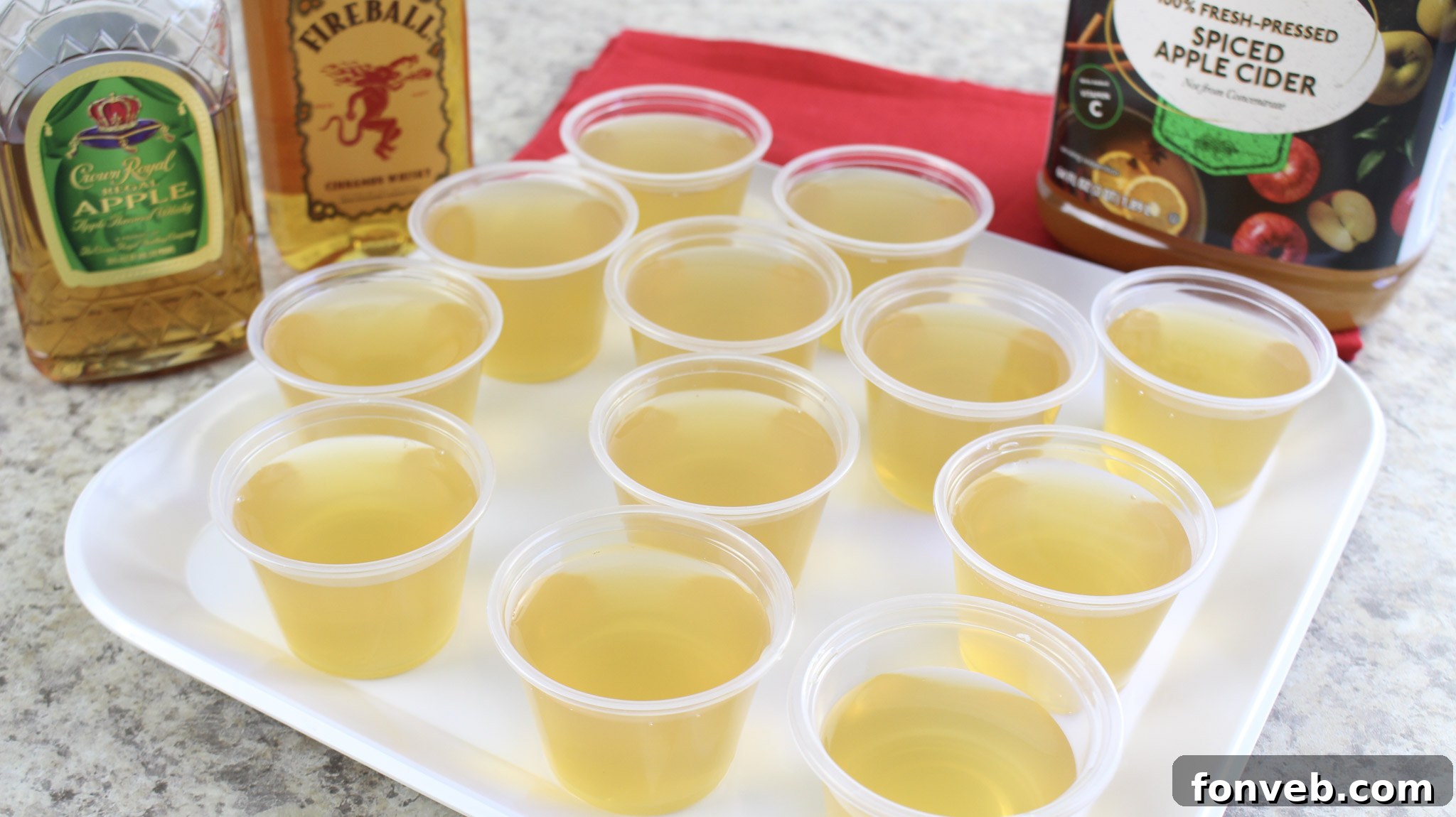 Close-up of Apple Pie Jello Shots in small cups, ready to serve