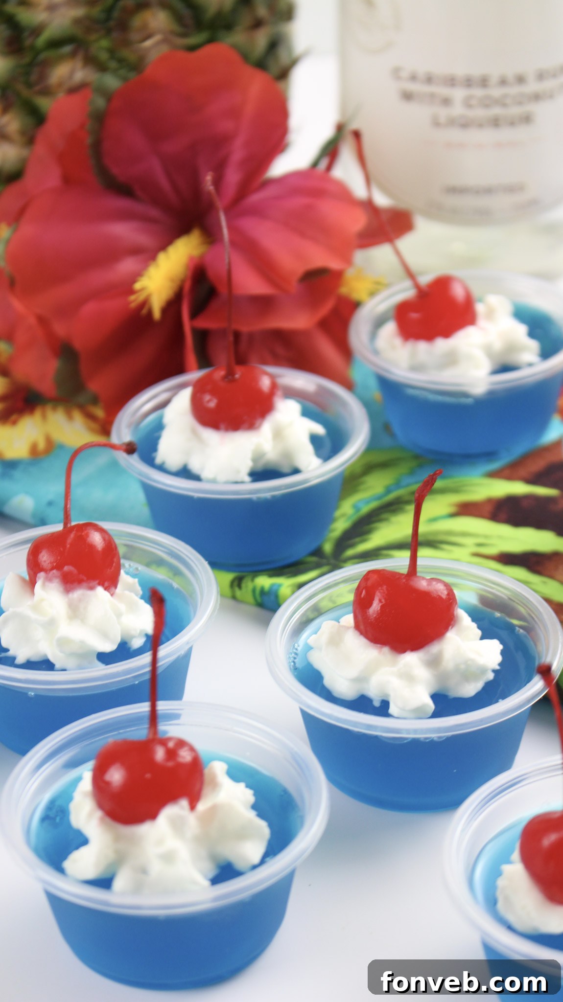 A set of Blue Hawaiian Jello Shots arranged on a tray, ready to be served, emphasizing their convenience and attractive presentation for any occasion.