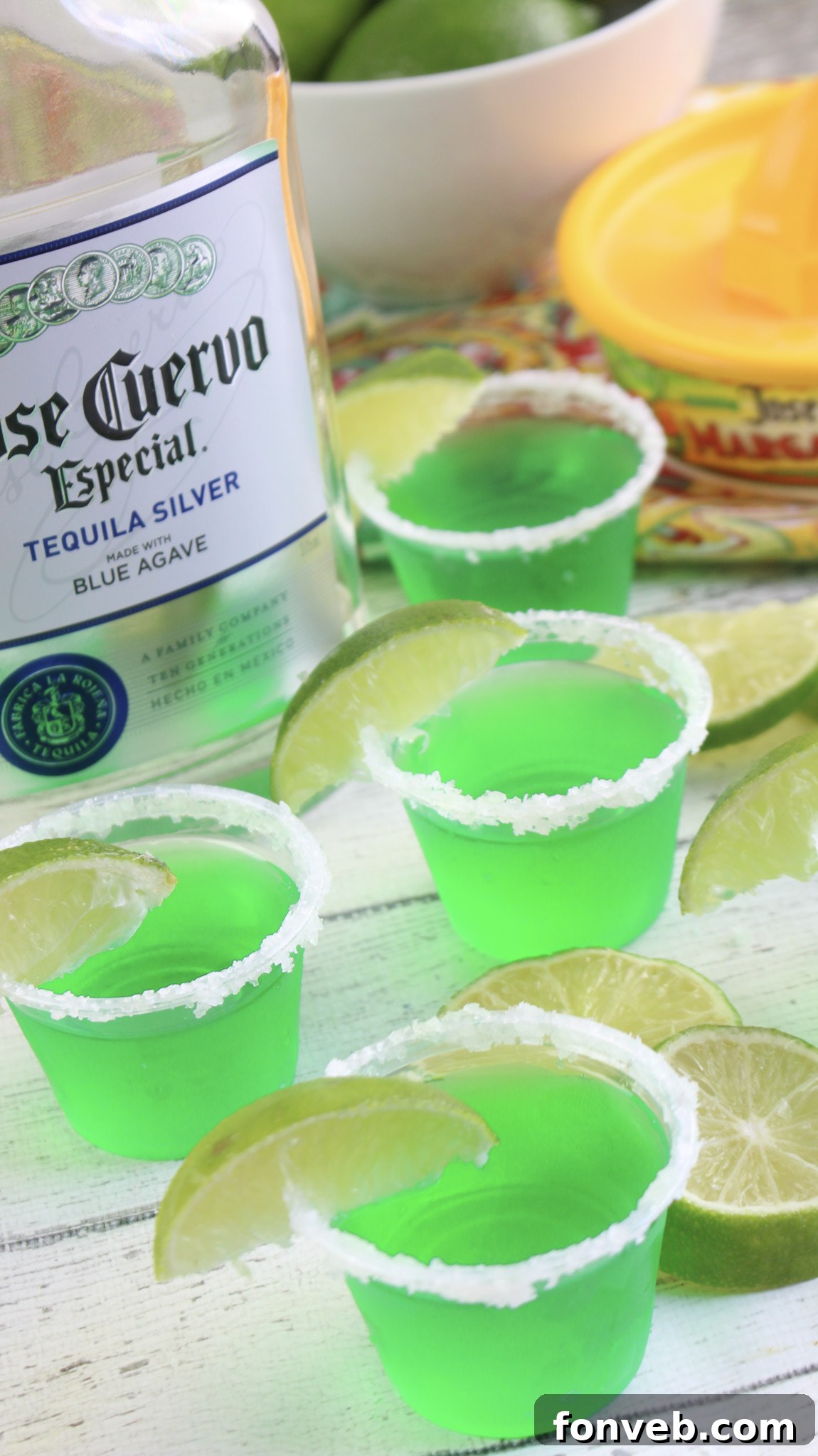 Close-up of a Margarita Jello Shot with a sugared rim and a lime garnish.
