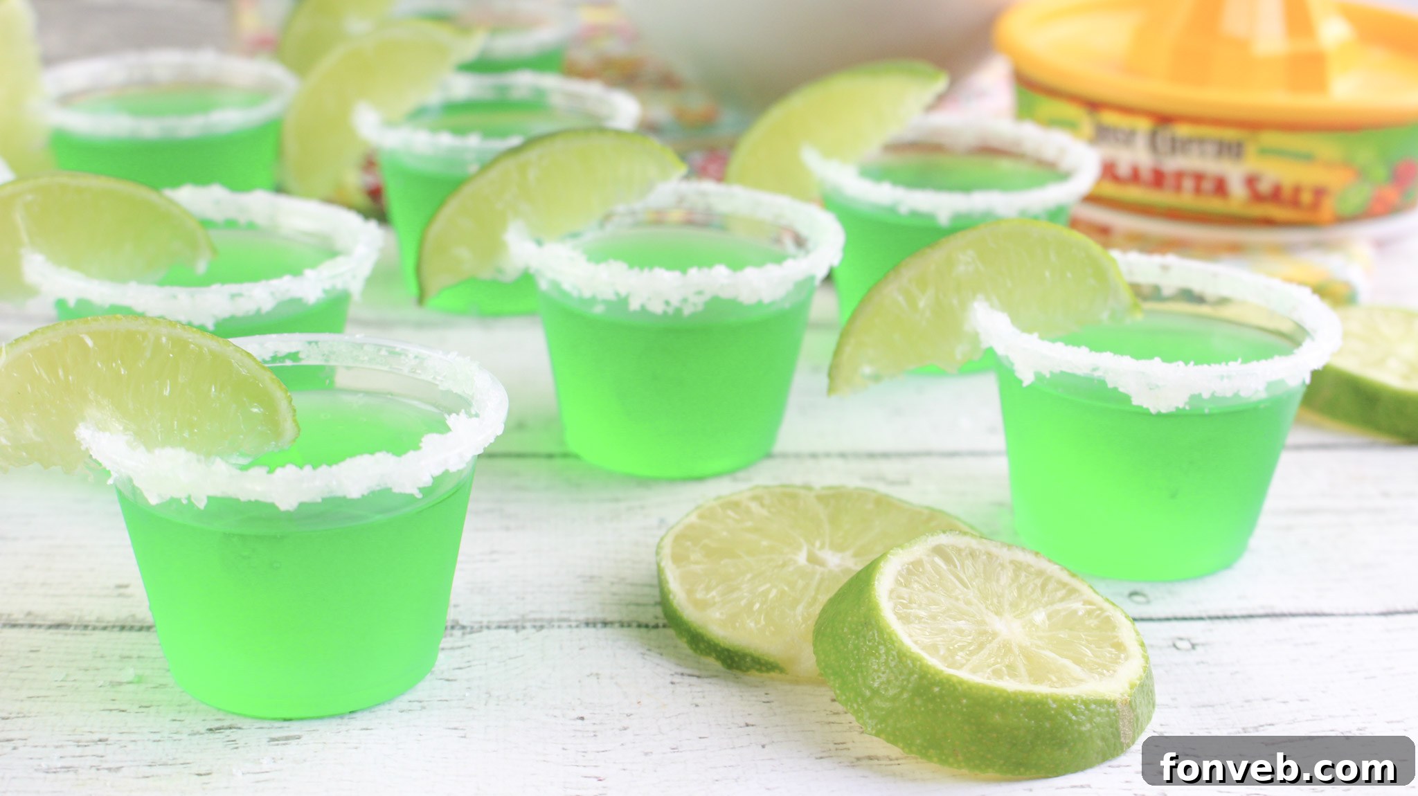 Margarita Jello Shots with various garnishes, highlighting the festive presentation.