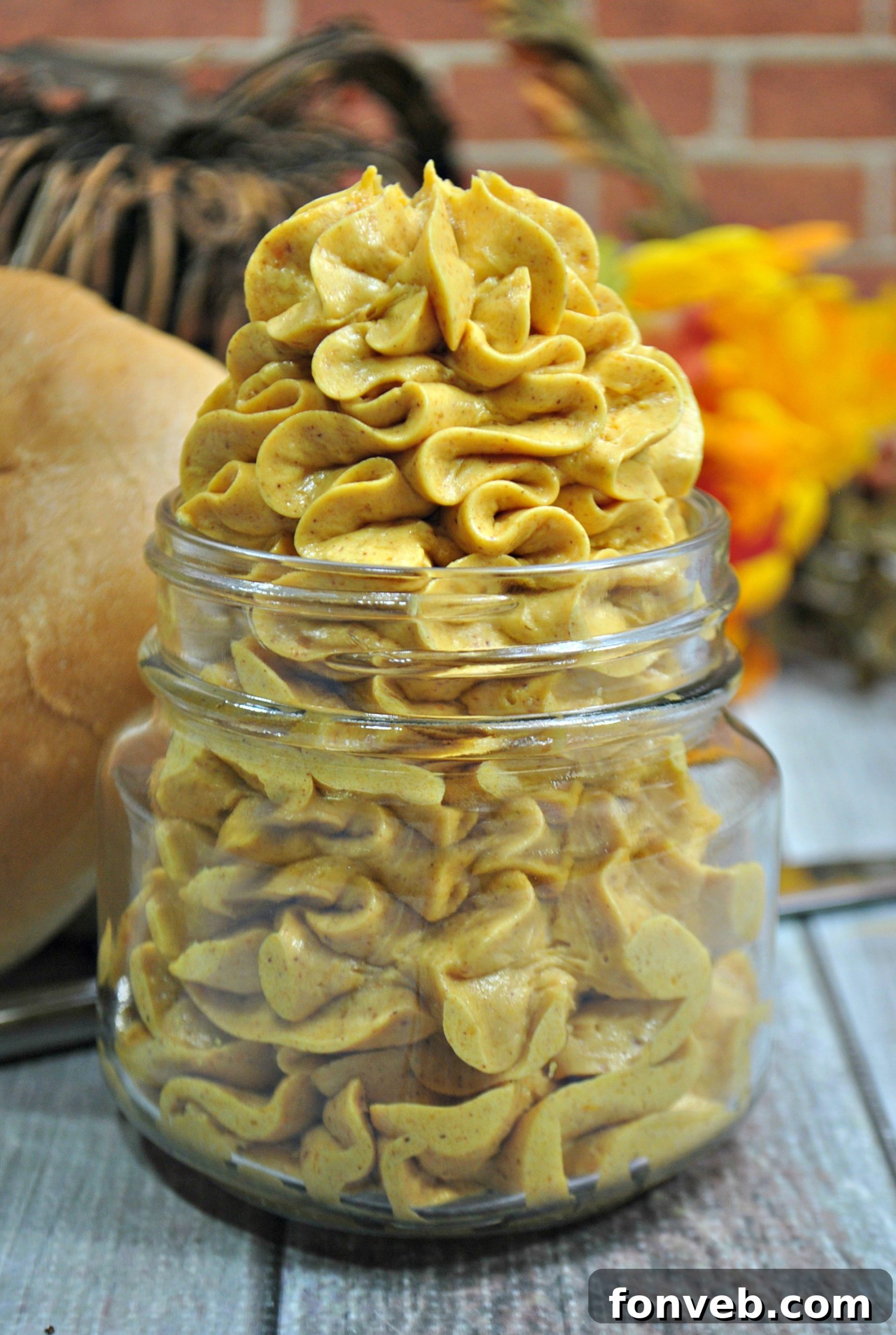Close-up of Honey Pumpkin Whipped Butter ready to be spread