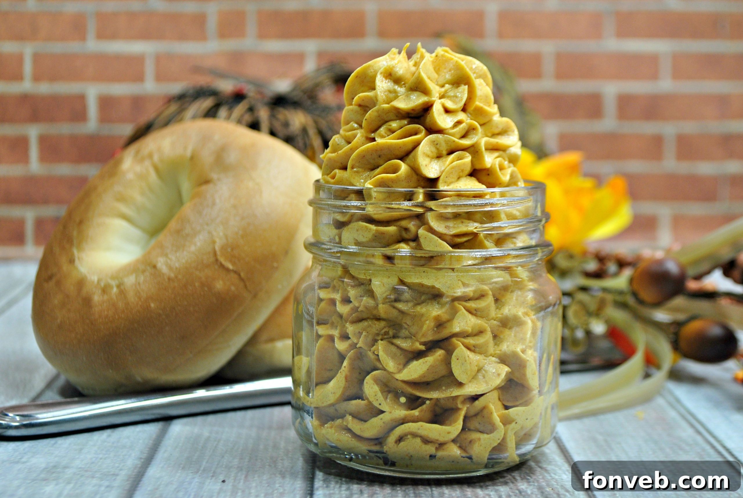 Honey Pumpkin Whipped Butter spread on bagels and toast