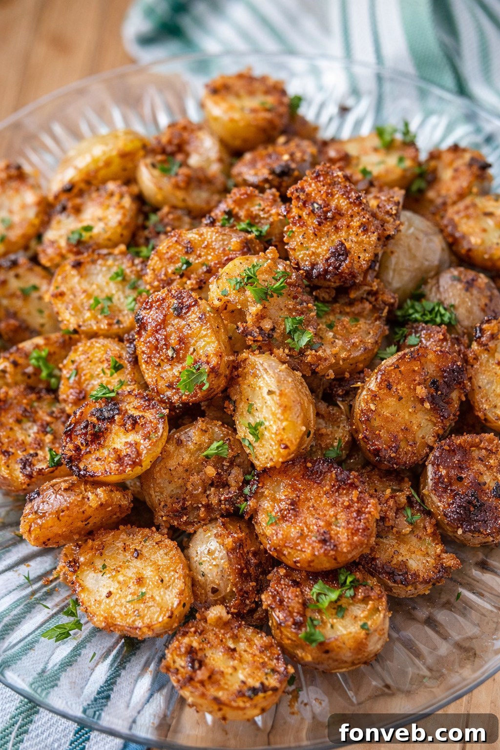 Crispy Garlic Parmesan Potatoes roasted to golden perfection, ready to be served.