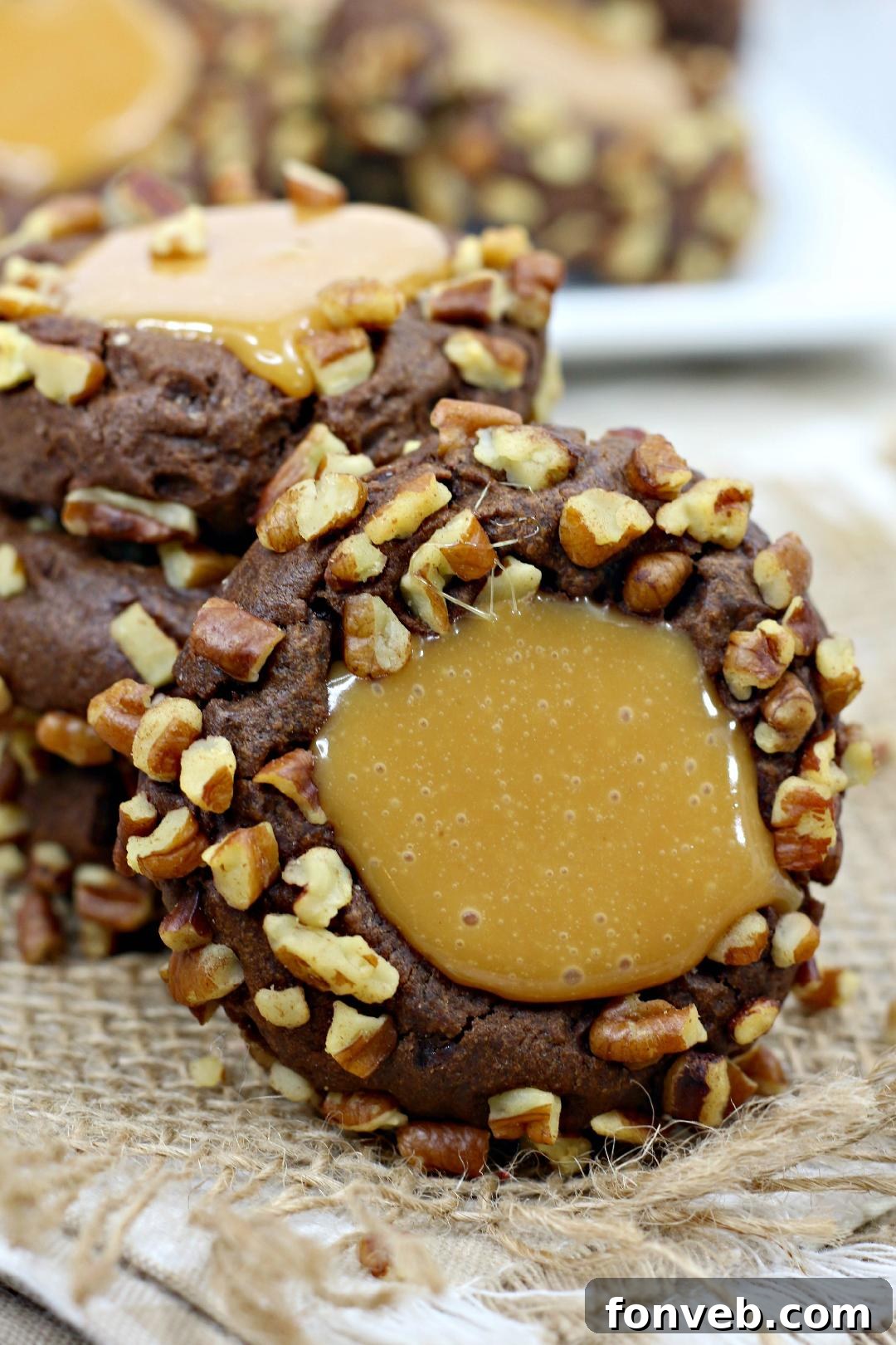 Chewy Turtle Thumbprint Delights 7 Close-up of a stack of delicious Turtle Thumbprint Cookies, highlighting the texture and layers.