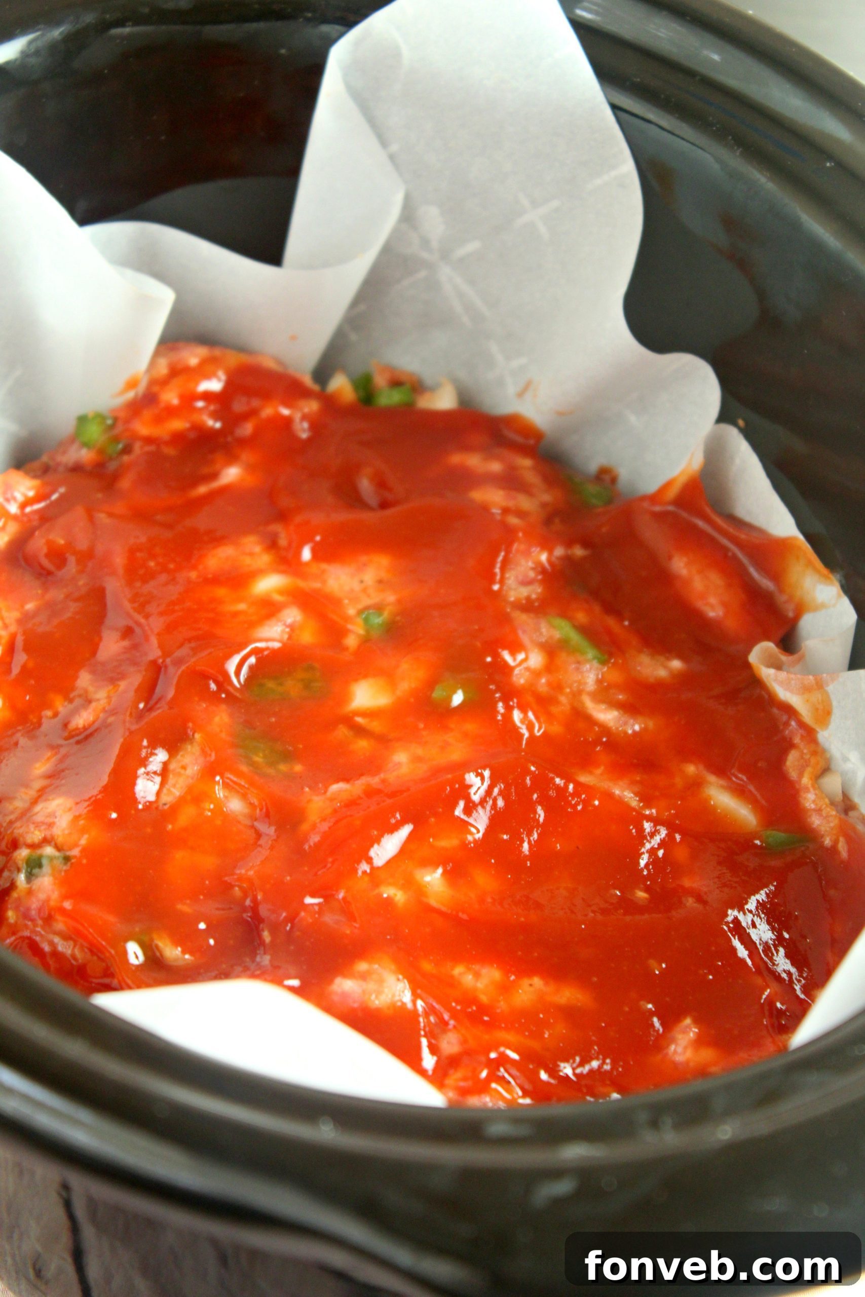 The finished slow cooker meatloaf, sliced and ready to be served.
