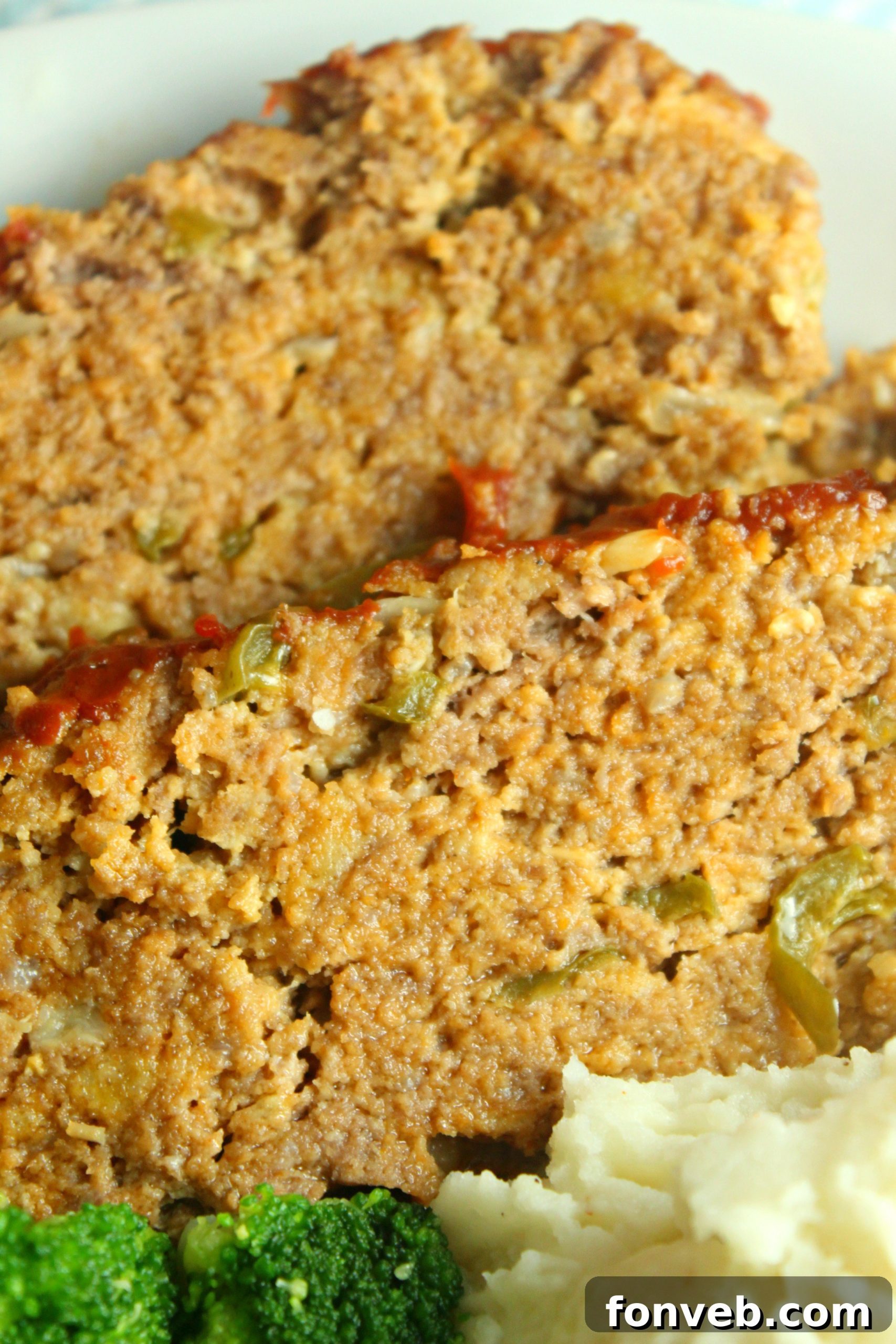 A large slow cooker with the lid slightly ajar, showing steam rising.