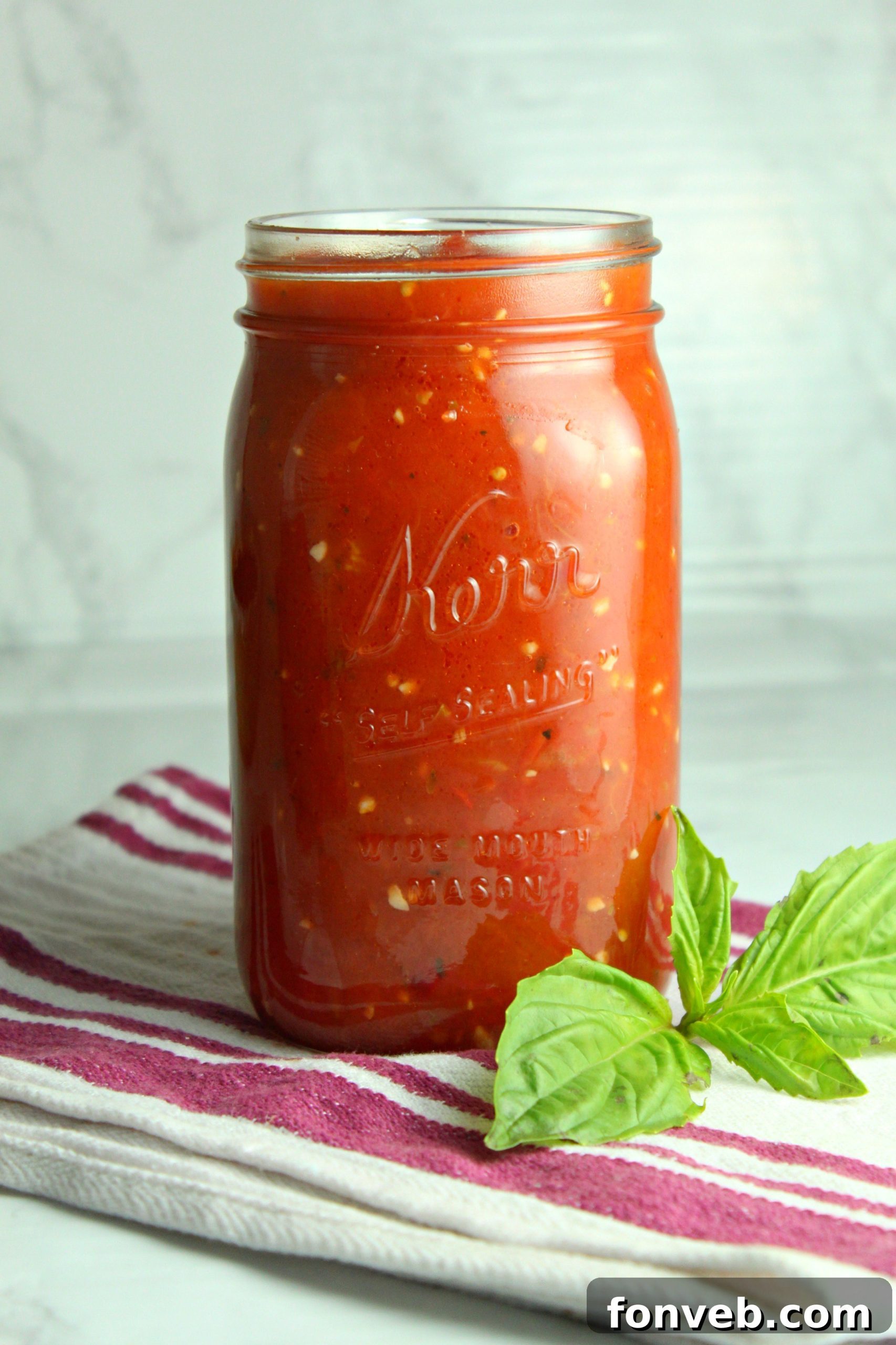 Onions and garlic gently sautéing in olive oil, creating an aromatic base for the sauce.