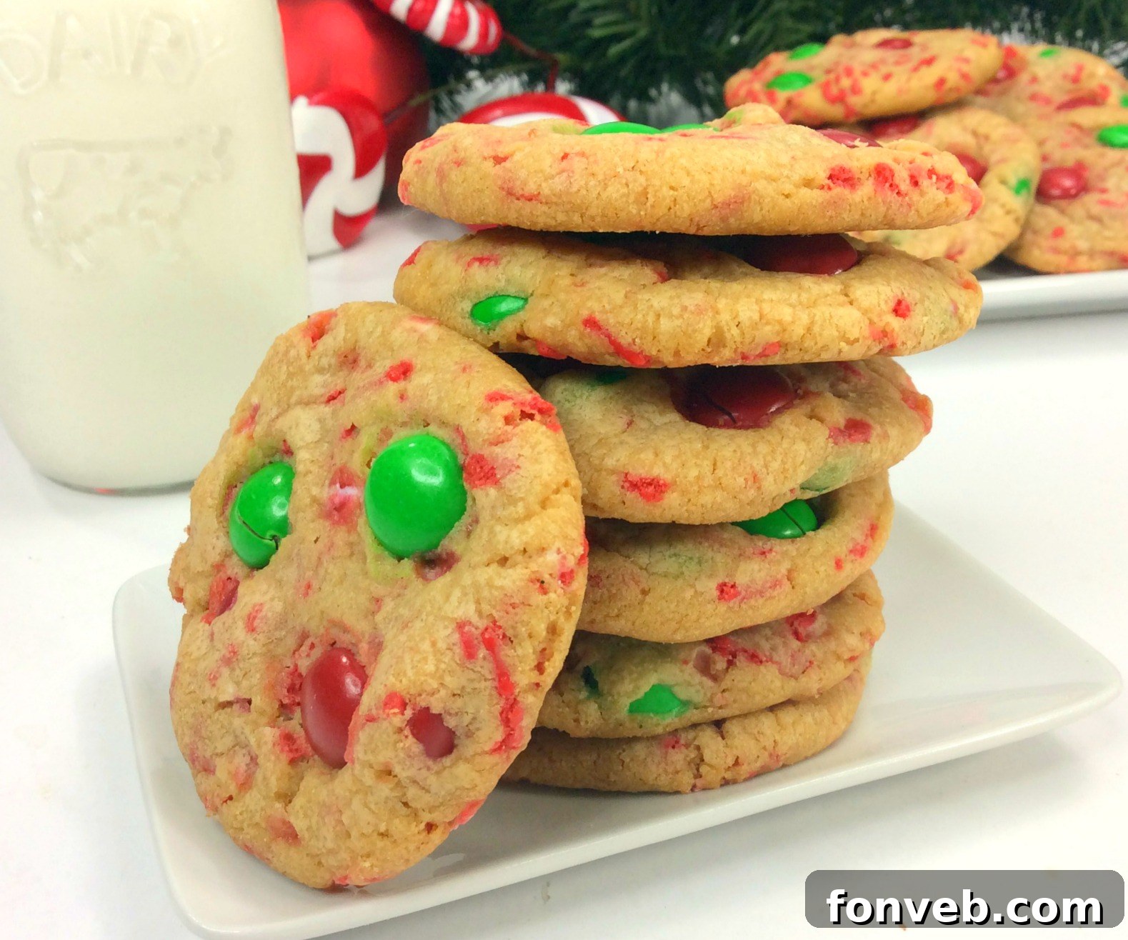 Spiced Christmas Pudding Cookies 5 Two baked Christmas Pudding Cookies on a cooling rack
