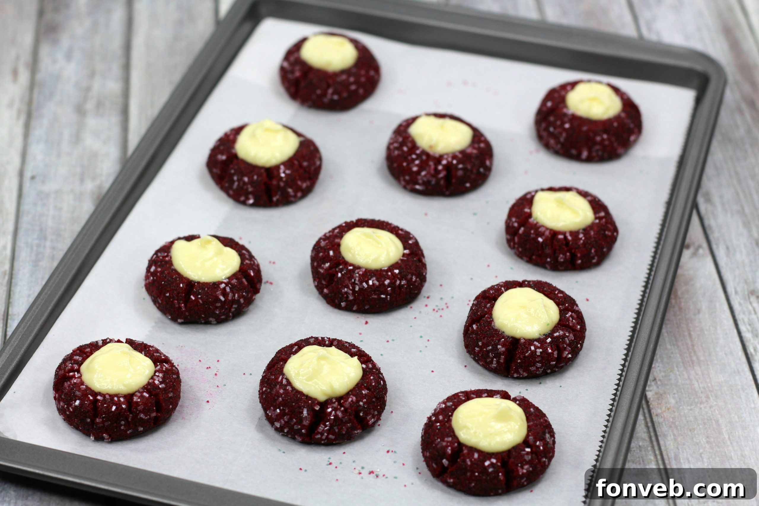 A close-up of a Red Velvet Cheesecake Cookie, showing the soft texture and perfectly set filling