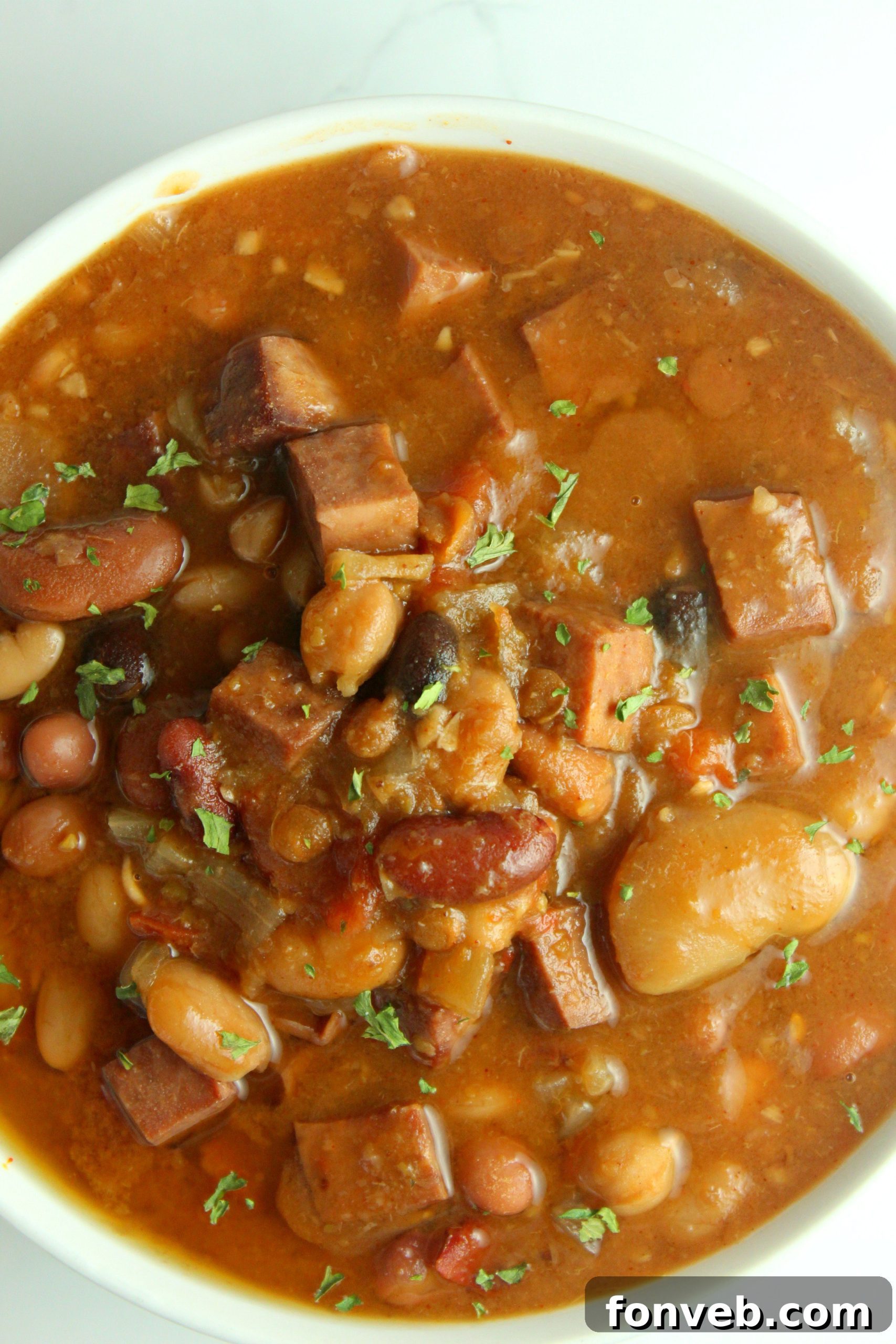 Set It and Forget It Ham and Bean Soup 3 Close-up of Slow Cooker Ham and Bean Soup, showing tender beans and ham pieces
