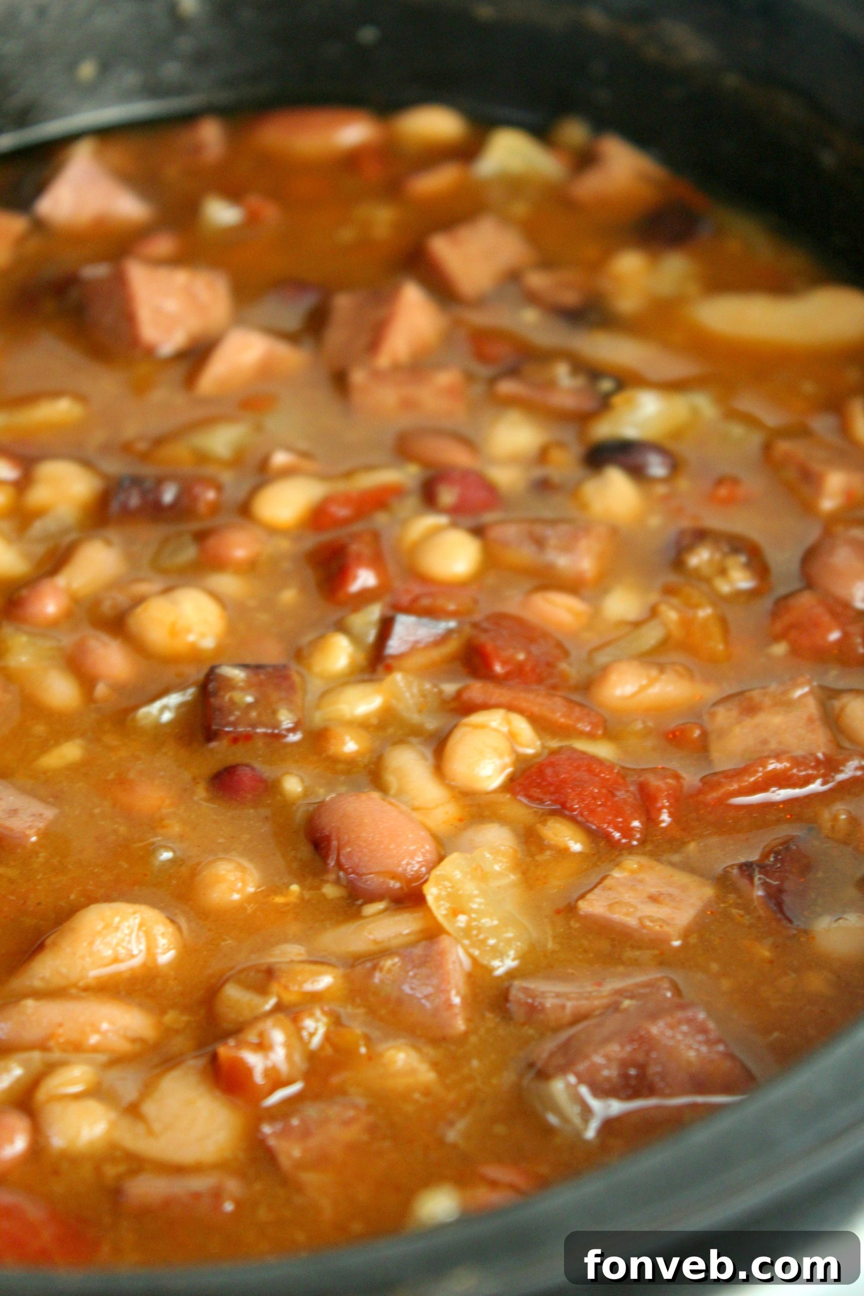 Set It and Forget It Ham and Bean Soup 6 Slow Cooker Ham and Bean Soup ready to be scooped from the pot