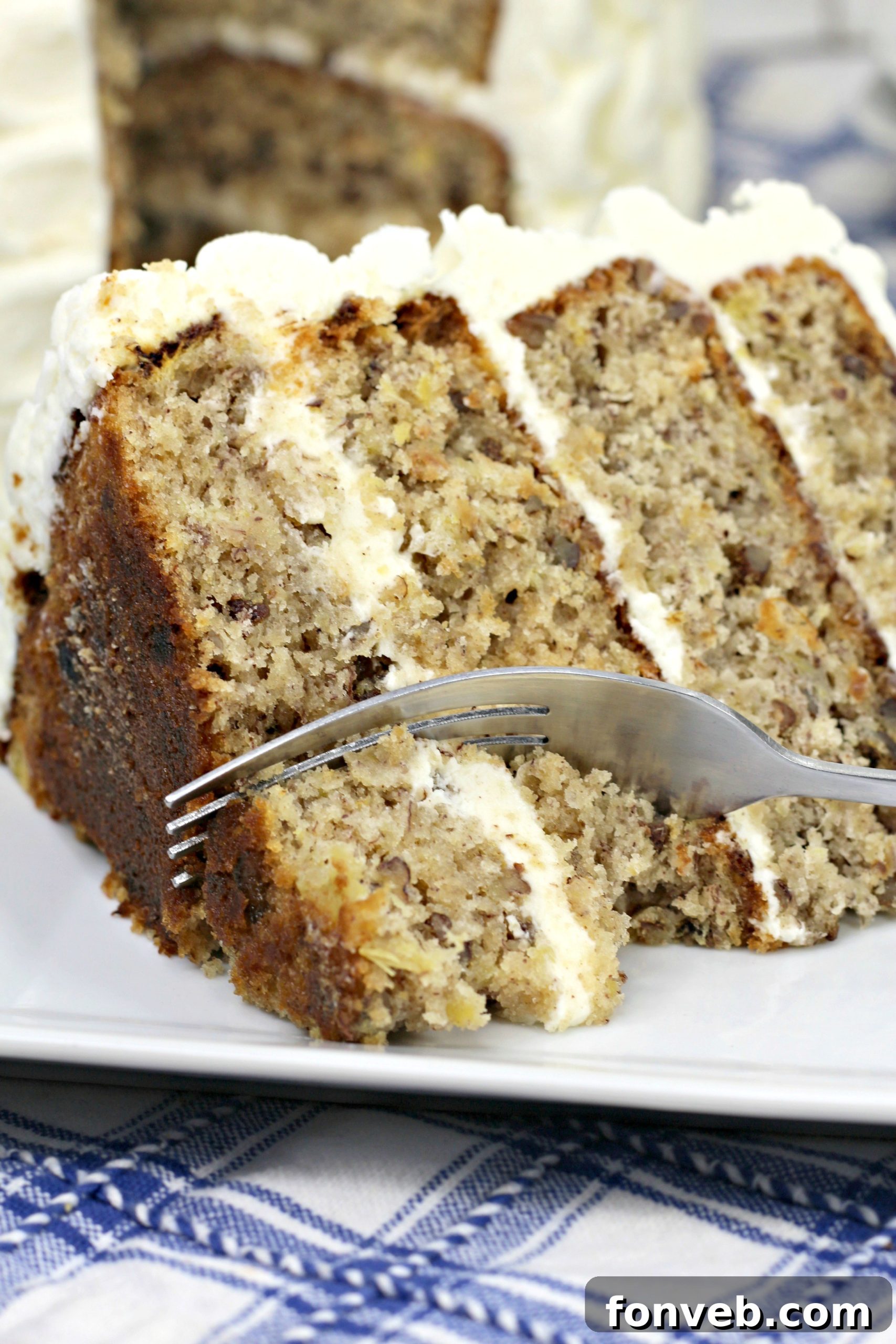 Southern Hummingbird Cake with Luscious Cream Cheese Frosting 2 Hummingbird Cake layers beautifully stacked with cream cheese frosting