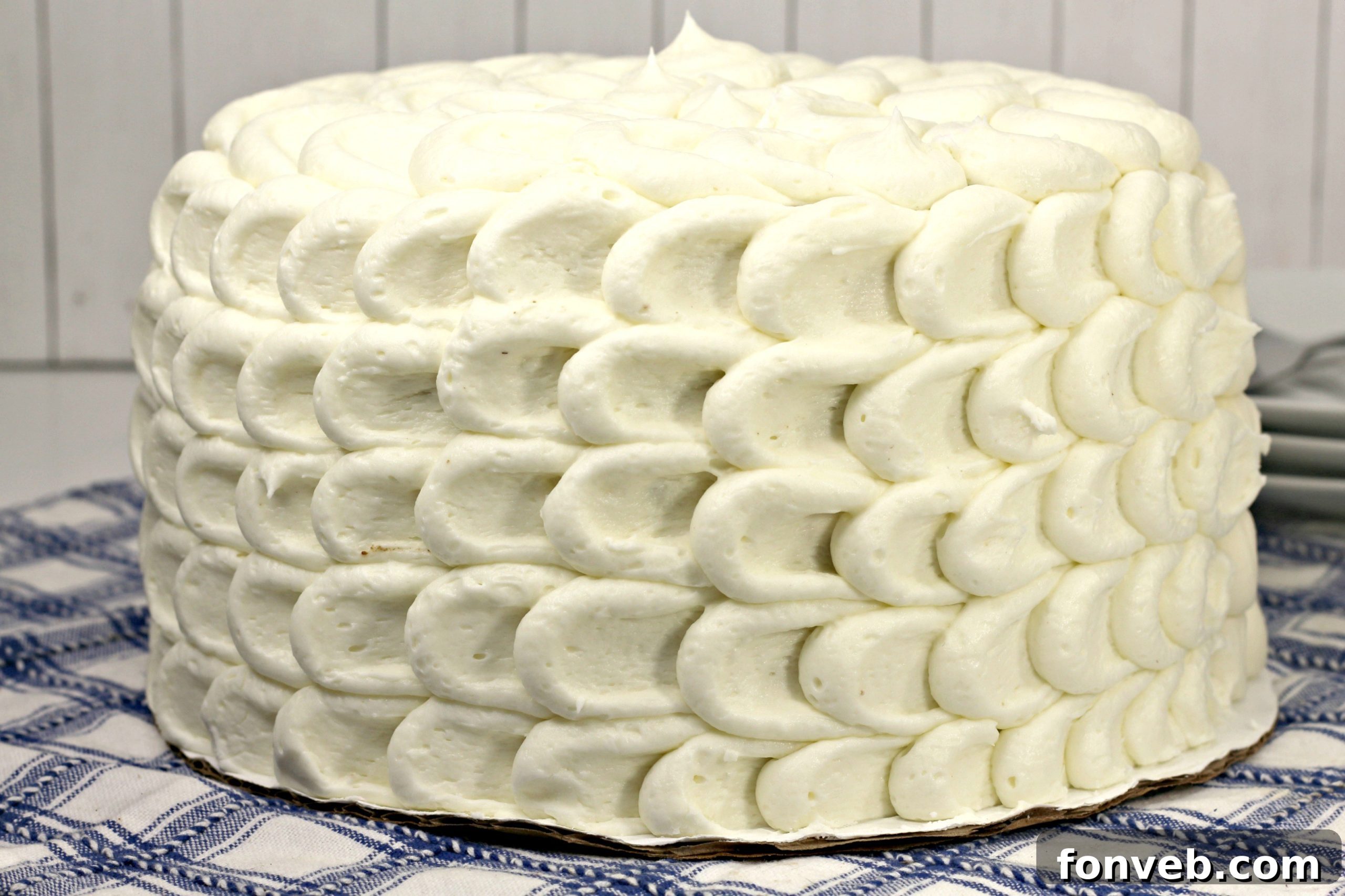 Southern Hummingbird Cake with Luscious Cream Cheese Frosting 3 Close-up of a slice of Hummingbird Cake showing its moist crumb and frosting