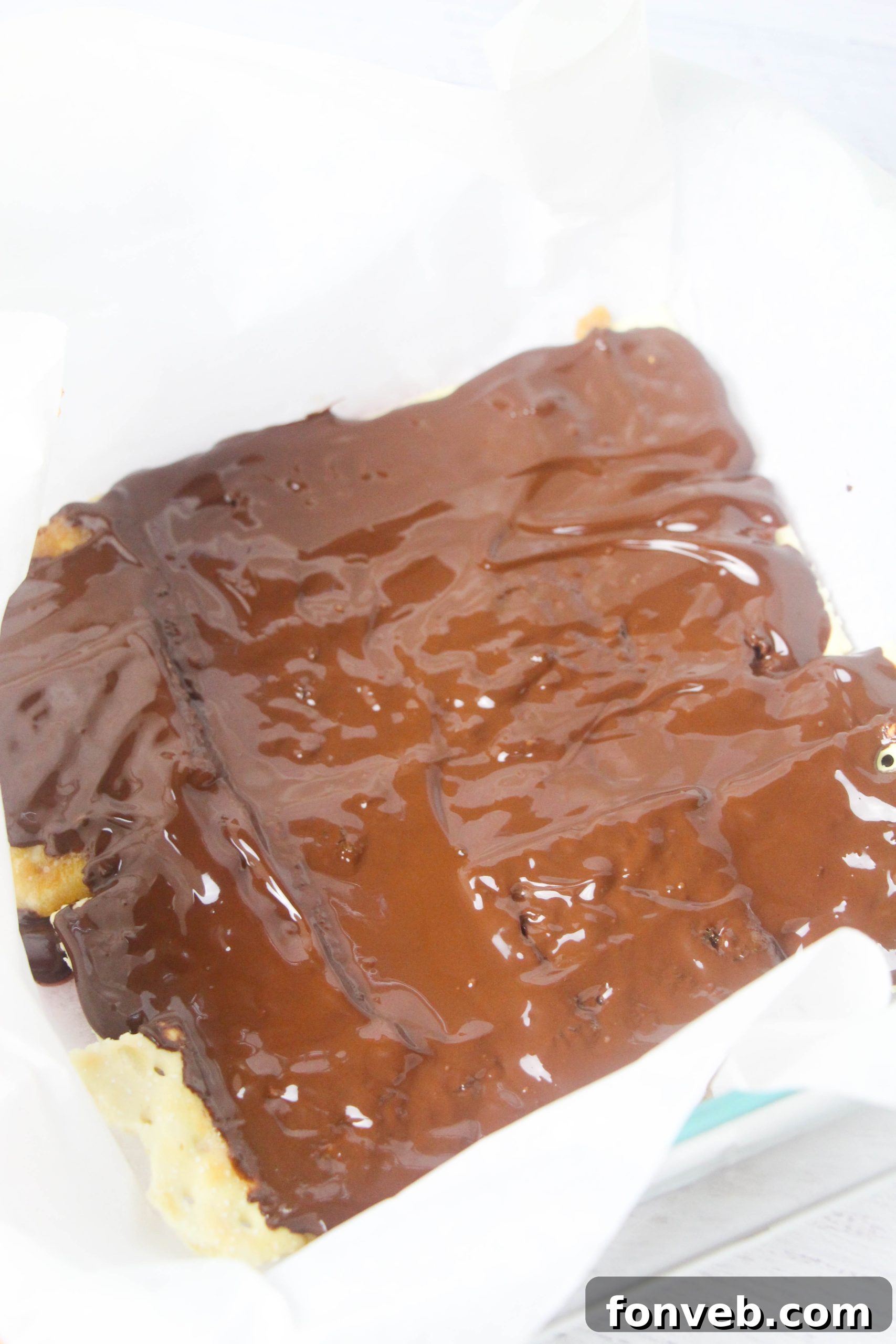 Different variations of Christmas Crack, including one with white chocolate and another with dark chocolate, showcased side-by-side.